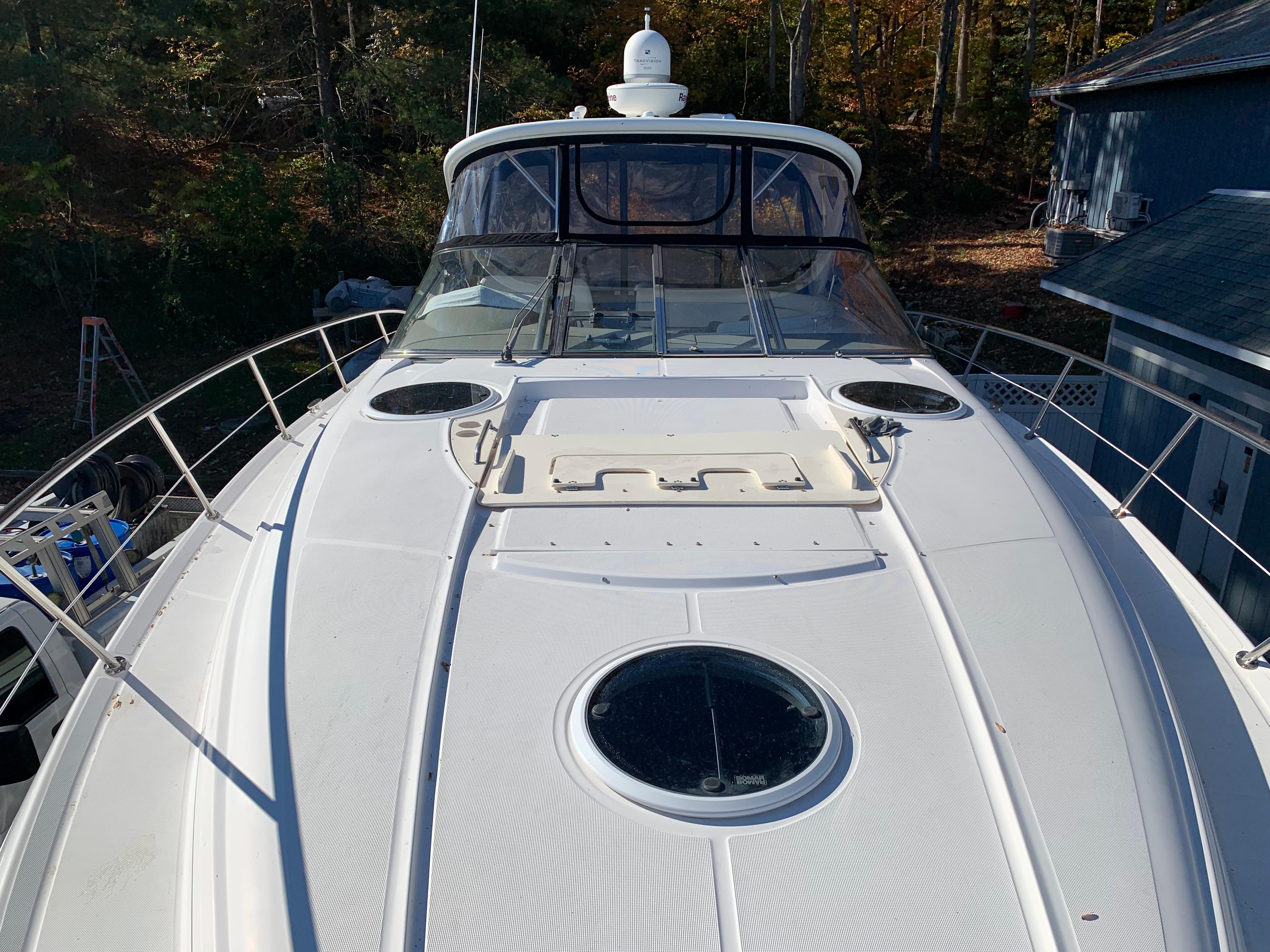 2009 Regal 4460 yacht with spacious deck and sleek design.