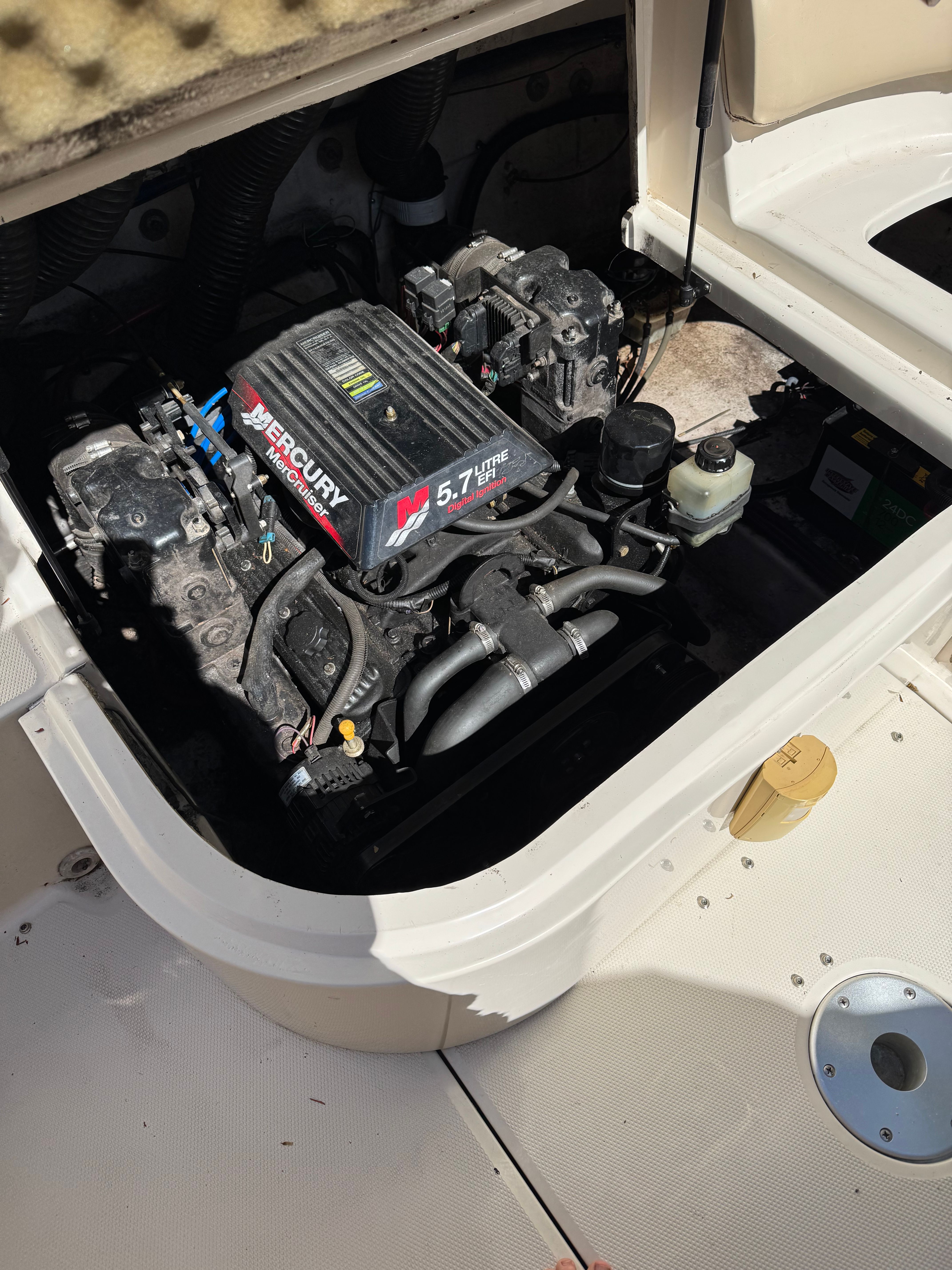 Engine compartment of a 2001 Sea Ray 240 Sundeck boat.