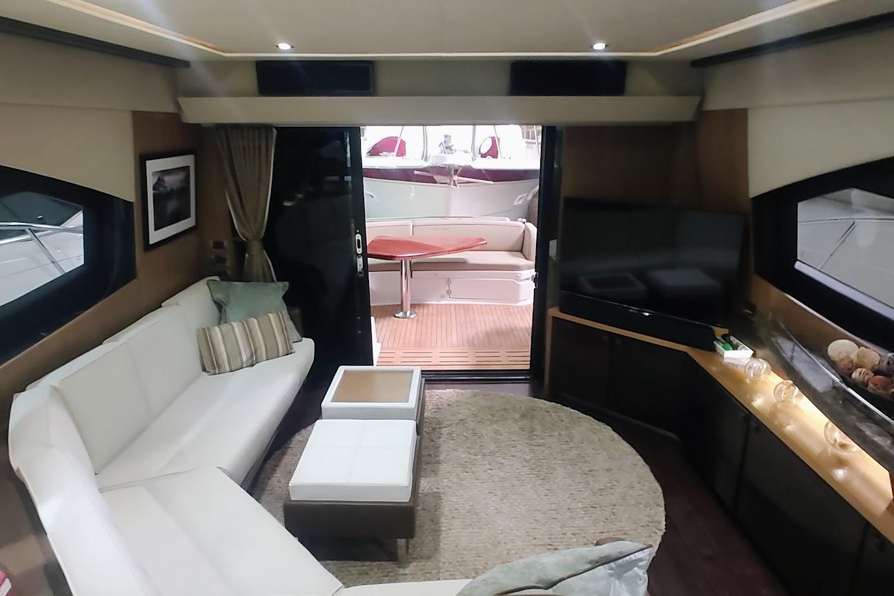 Luxurious interior of 2016 Sea Ray L590 yacht with modern furnishings and elegant decor.