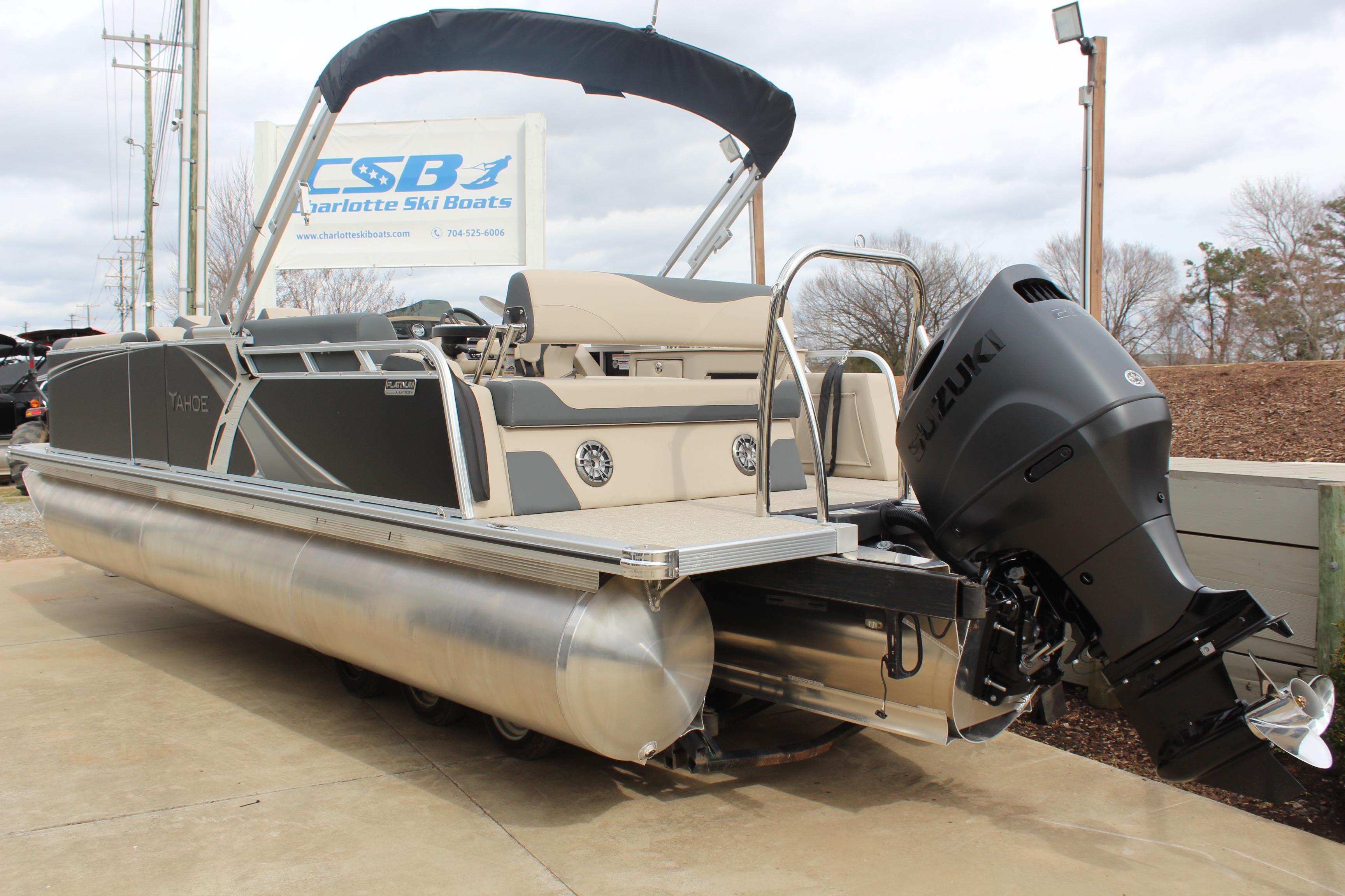 2026 Tahoe Pontoon LTZ boat with Suzuki outboard motor at Charlotte Ski Boats.