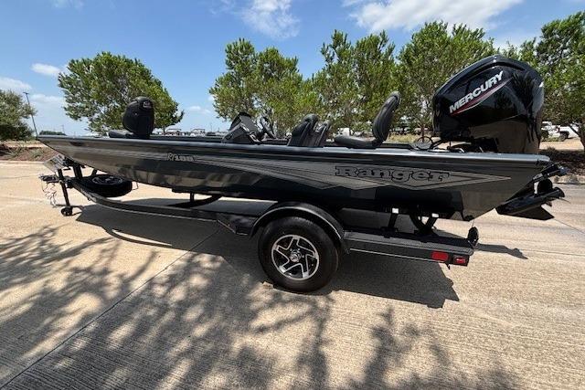 2026 Ranger RT188 boat with Mercury engine on trailer, parked outdoors.