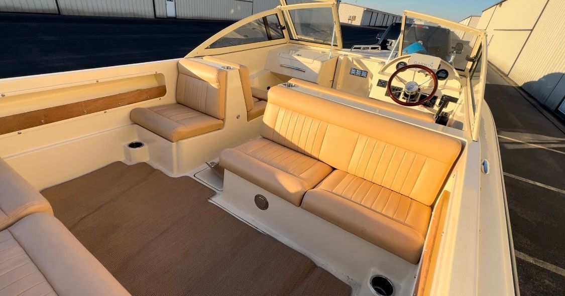 2018 Rossiter Coastal Cruiser with beige seating and wood accents in the interior.