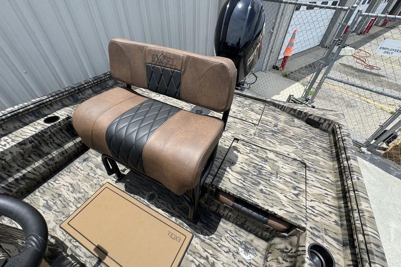 2027 Excel 230 Bay Pro Elite boat with camo design and cushioned seating.