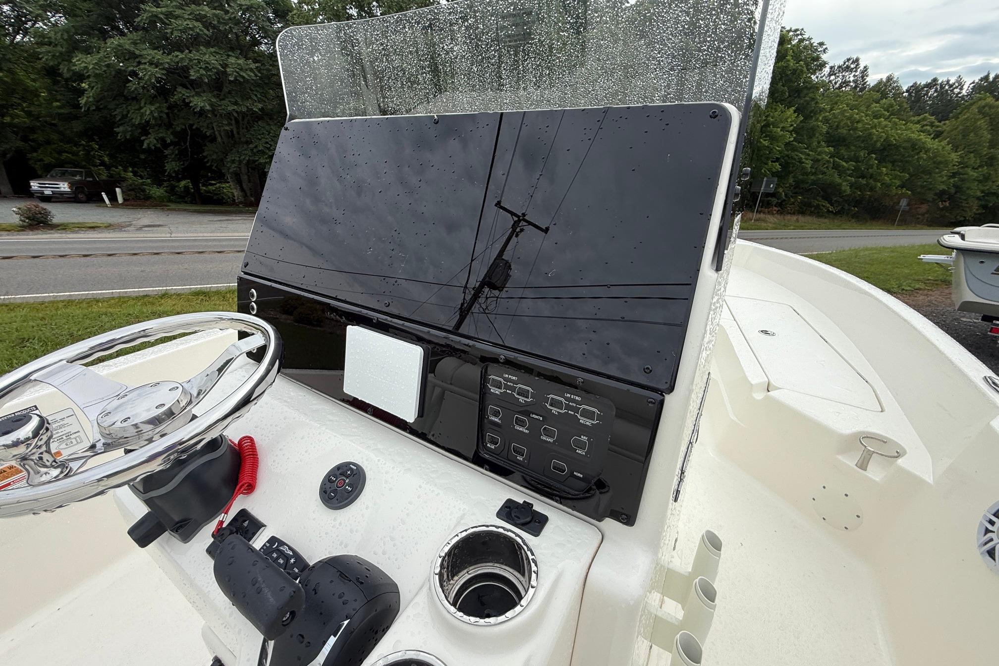 2026 Skeeter SX2350 boat console with steering wheel and control panel.