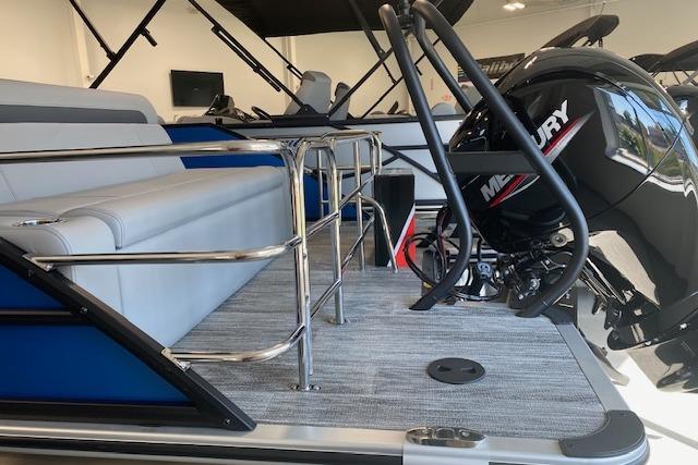 2026 Bentley Pontoons Legacy 223 Swingback with Mercury engine, featuring sleek seating and modern design.
