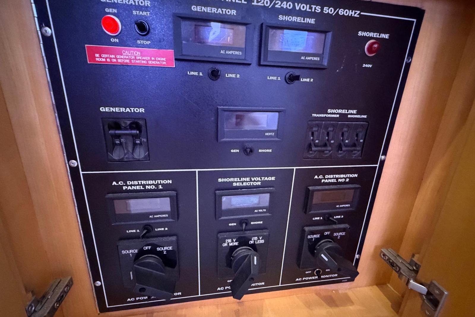 Electrical control panel on a 2003 Hatteras 54 Convertible yacht.