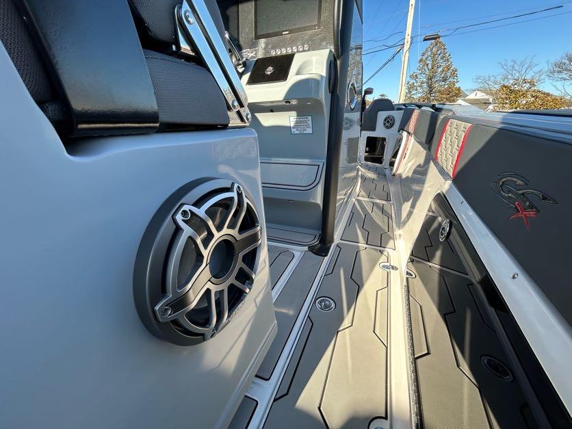2024 Glasstream 32 GSX boat interior with speaker and modern dashboard.