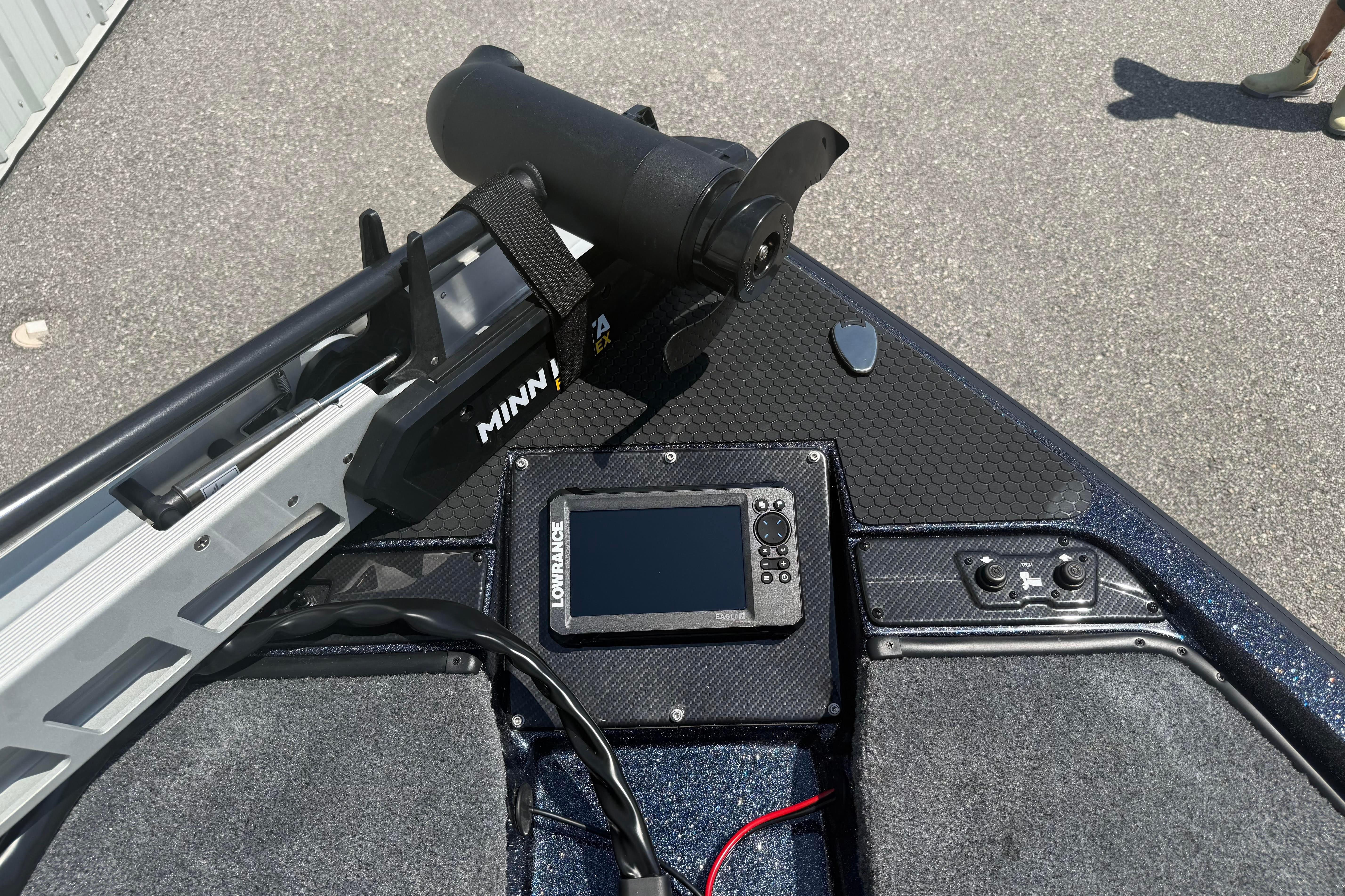 Front deck of a 2027 Phoenix 819 ZXL boat with Minn Kota trolling motor and Lowrance fish finder.