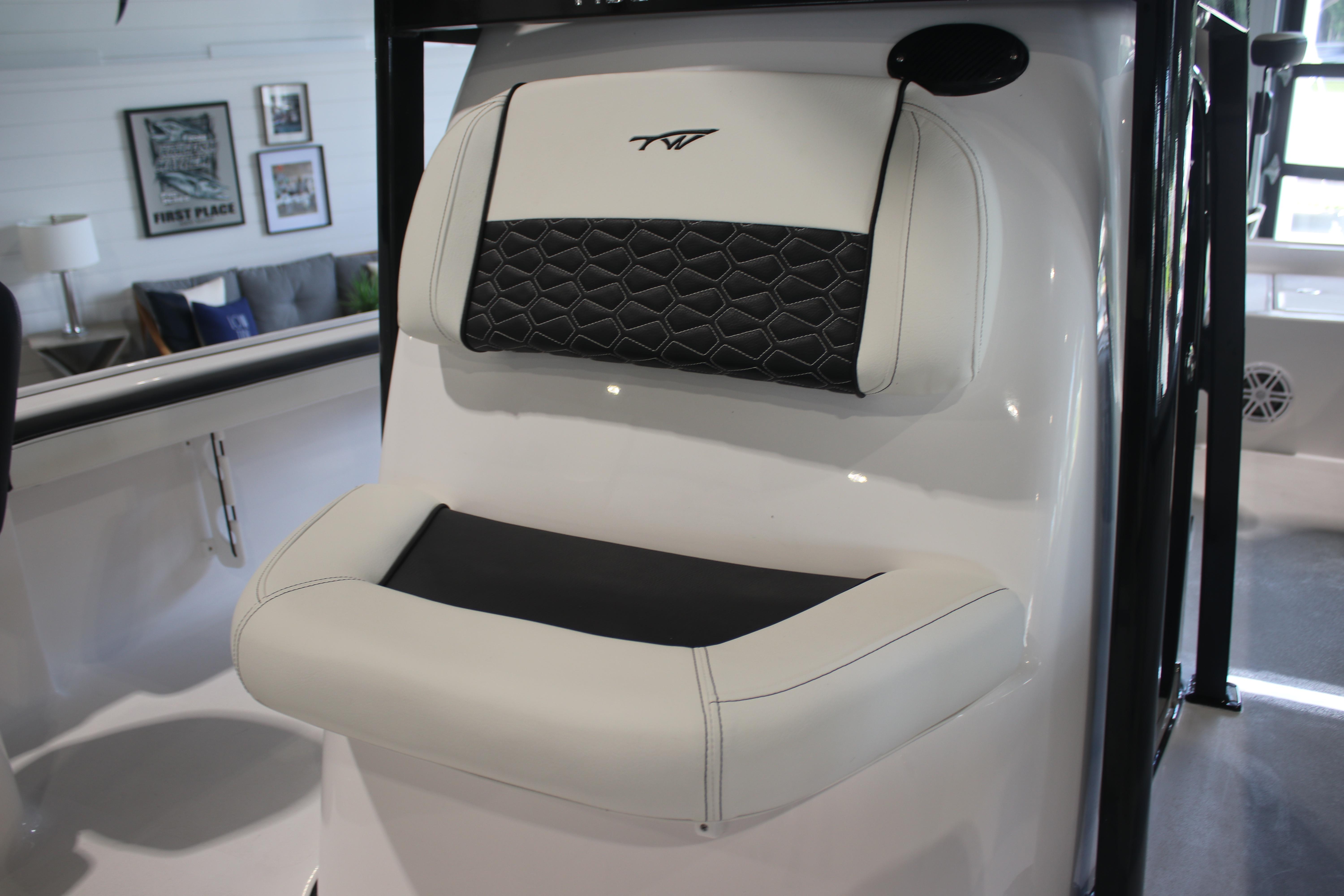 2026 Tidewater 2300 Carolina Bay boat seat with black and white upholstery.