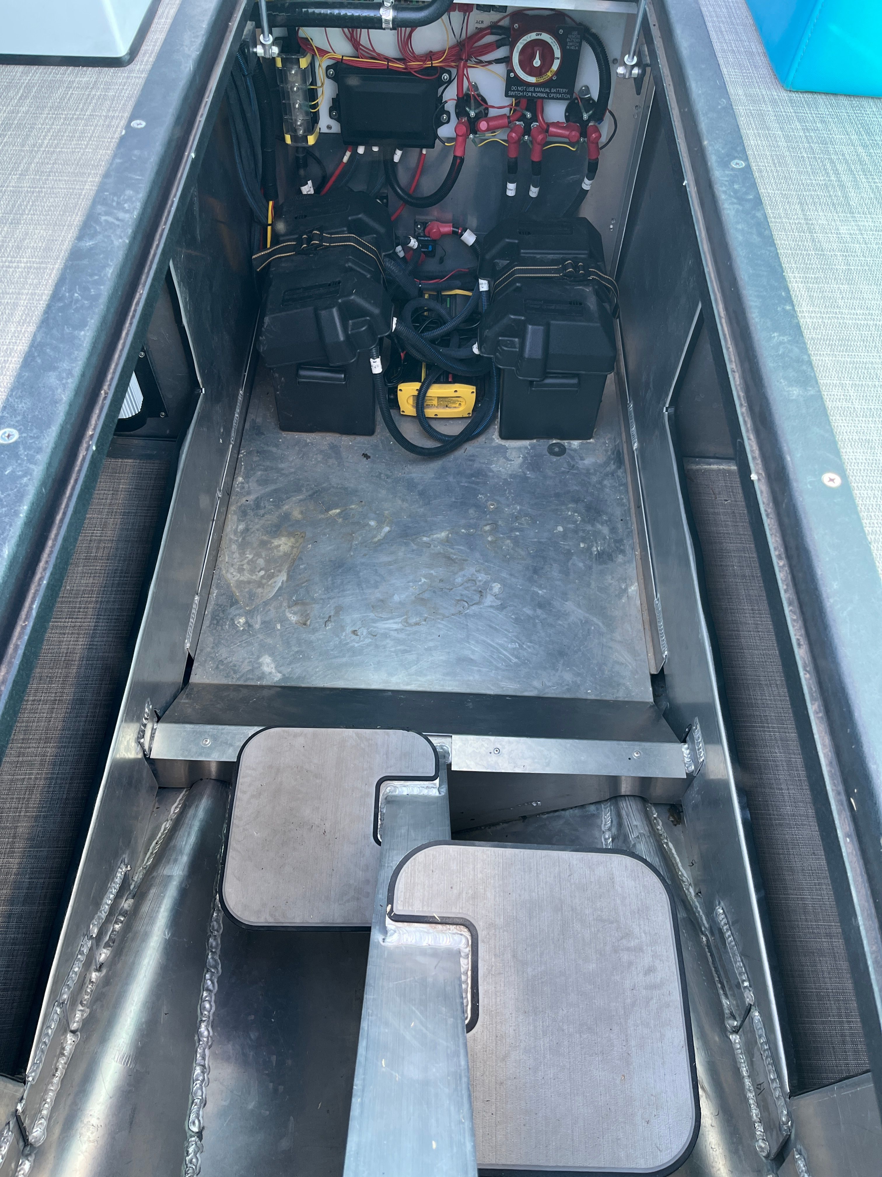 Interior view of 2023 Montara Surf Boss 2.0 with batteries and wiring.