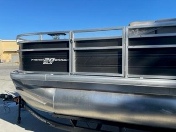 2024 Sun Tracker Fishin' Barge 20 DLX pontoon boat side view.