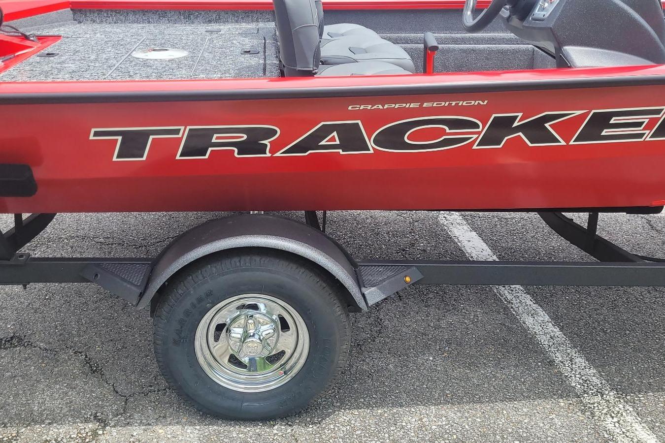 2026 Tracker Pro Team 175 Crappie Edition boat on trailer, red exterior.