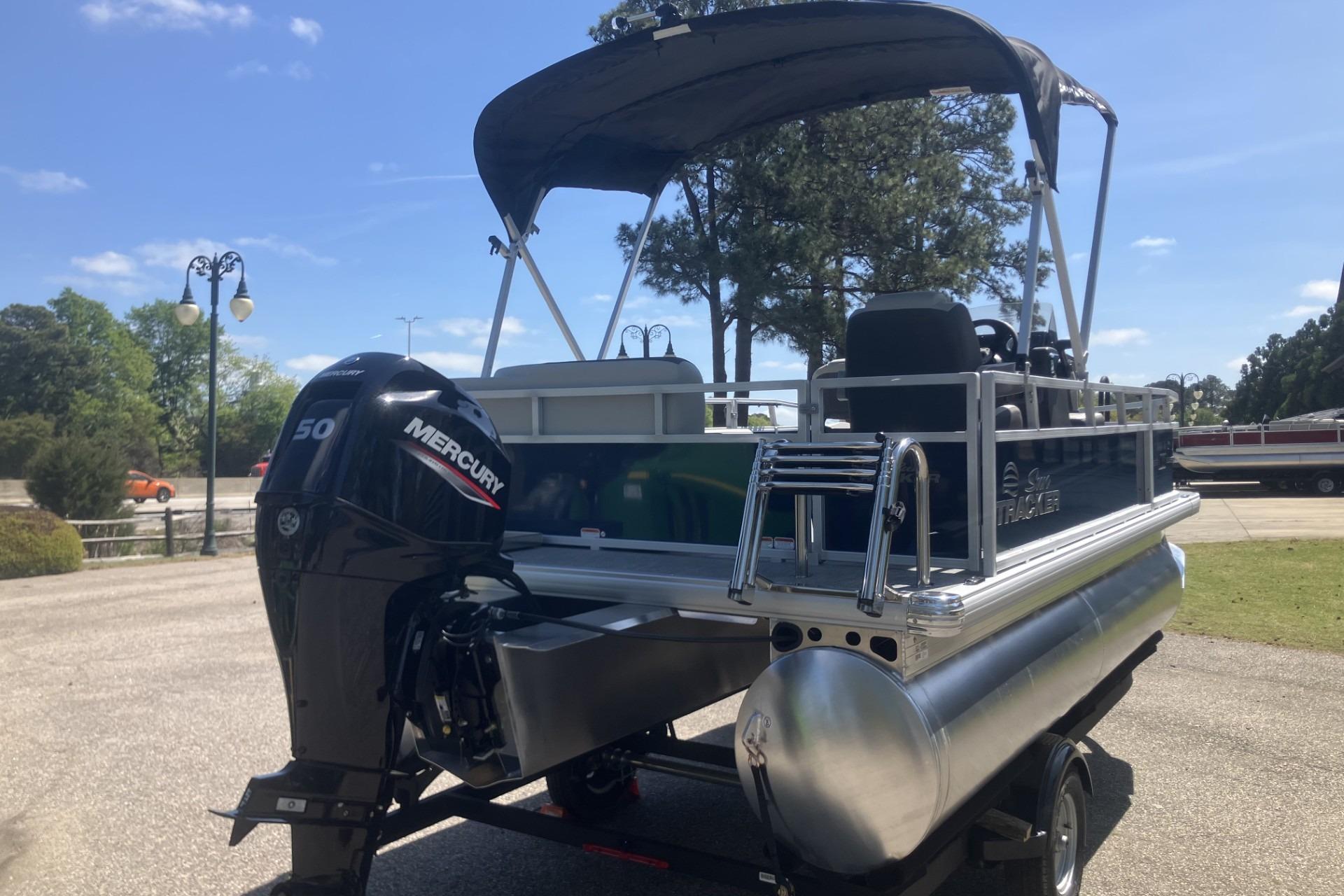 2026 Sun Tracker Bass Buggy 16 XL Select pontoon boat with Mercury 50 engine.