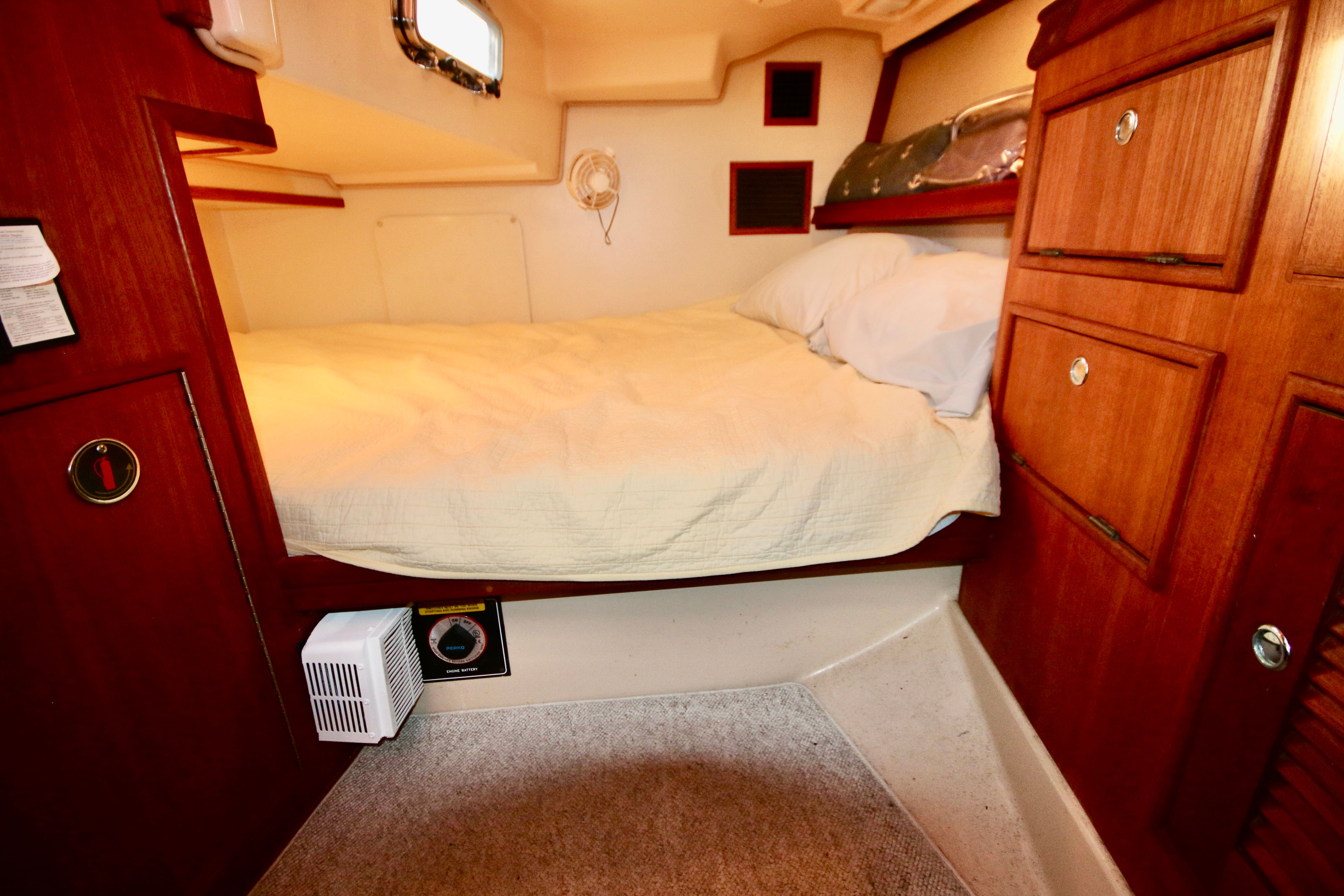 Interior of 2002 Island Packet 380 yacht with cozy bed.