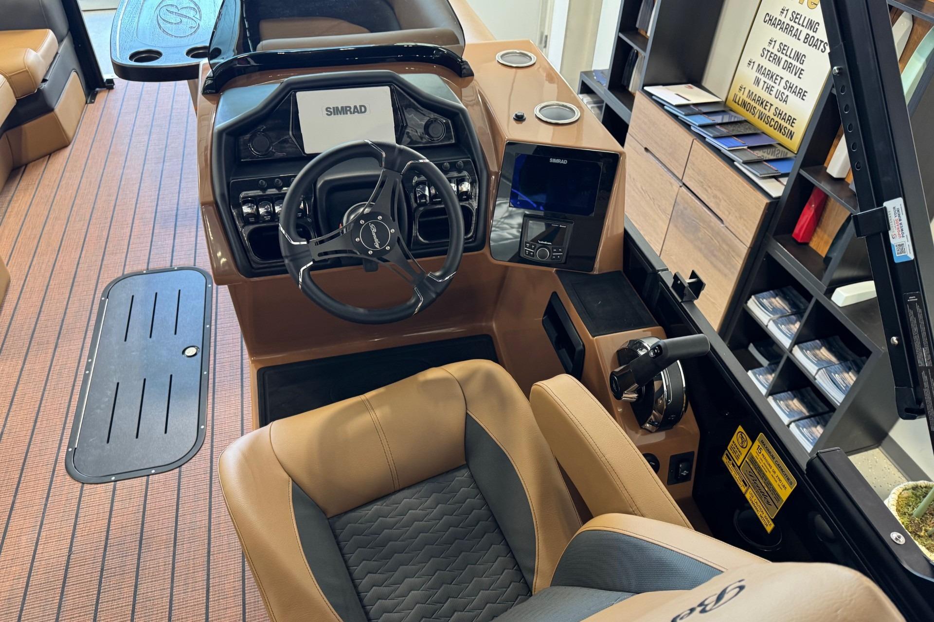 Interior of 2026 Bentley Pontoons Elite 223 Swingback with modern steering and controls.