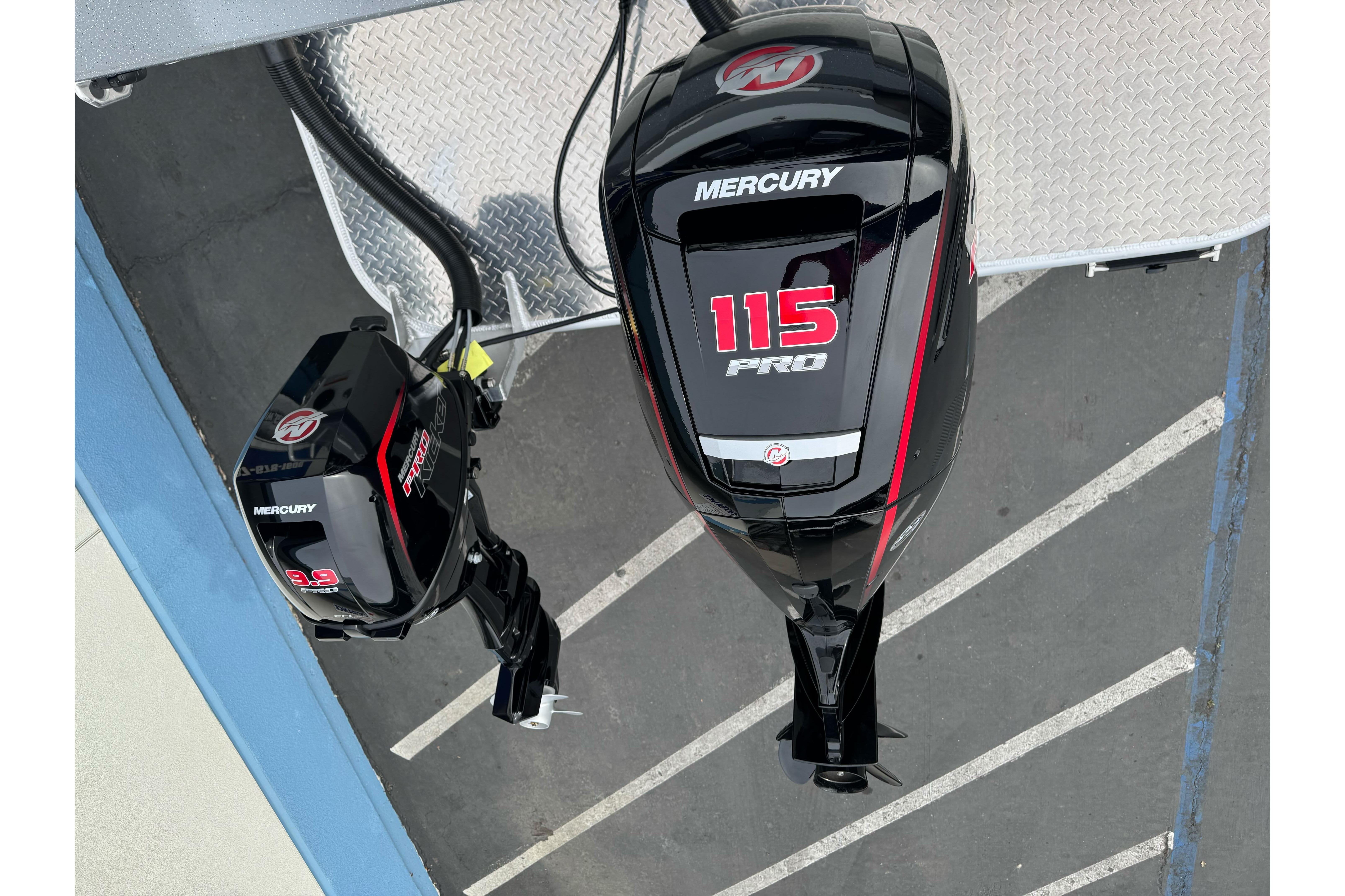 Overhead view of Mercury 115 Pro and 9.9 outboard motors on Lund 185 Heavy Gauge, 2026 model.