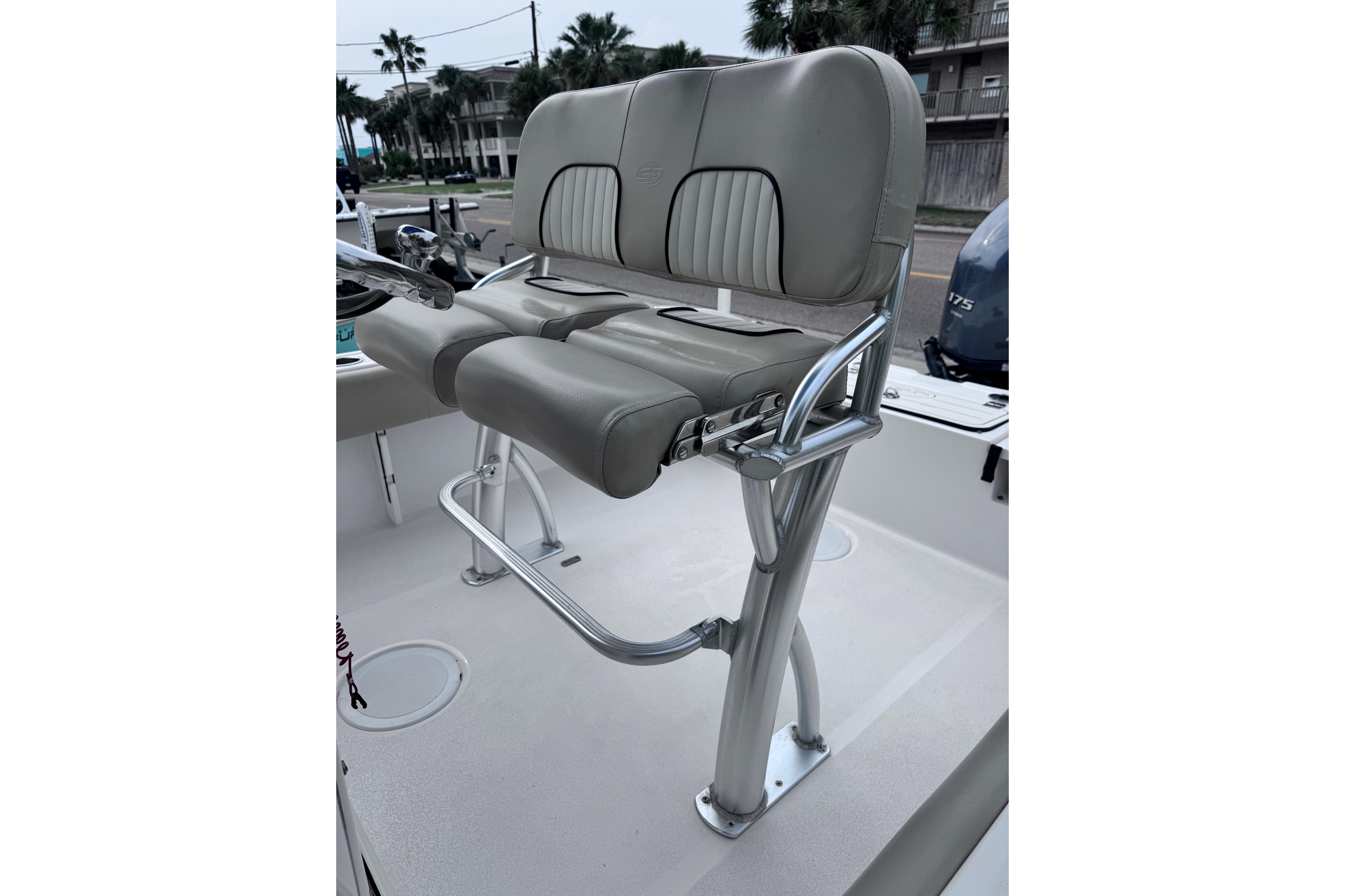 2018 Sea Fox 206 Commander boat seat with stainless steel frame and cushioned backrest.
