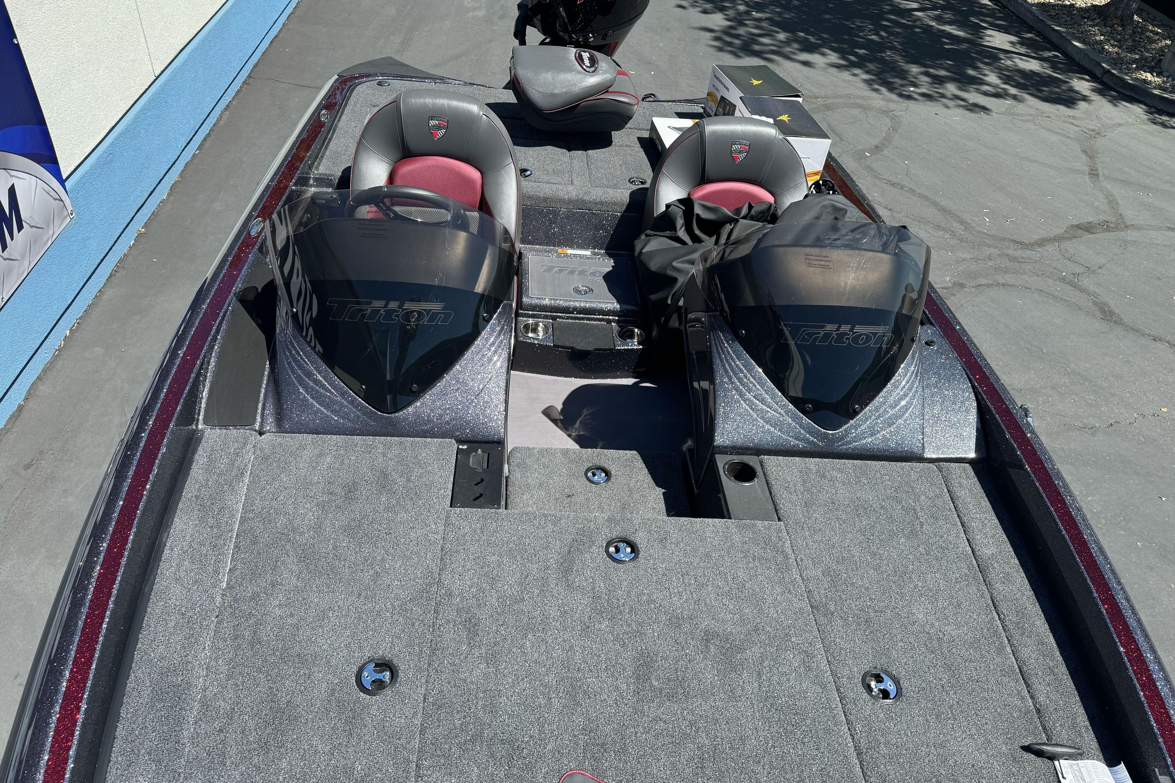2026 Triton 18 TrX boat interior with dual seats and steering consoles.