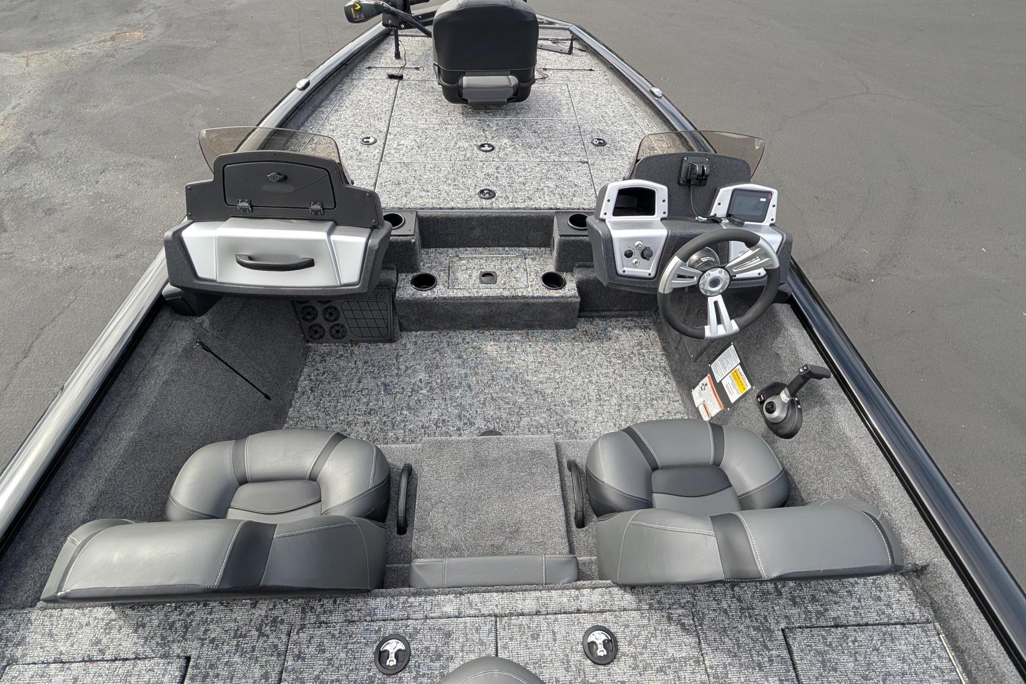 2026 Tracker Pro Team 195 boat interior with steering wheel and seating.