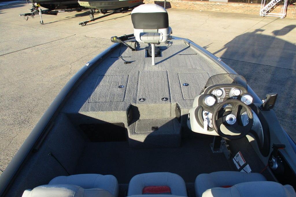 2017 Tracker Pro Team 195 TXW boat interior with steering console and seating.