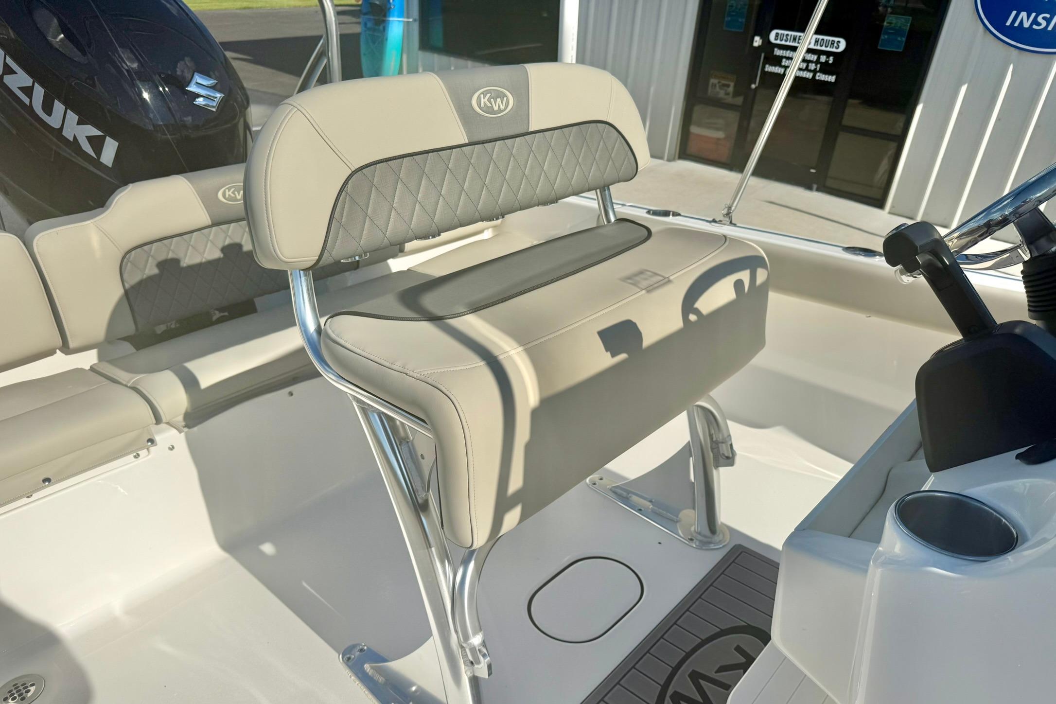 2026 Key West 189 FS boat interior with seating and steering console.