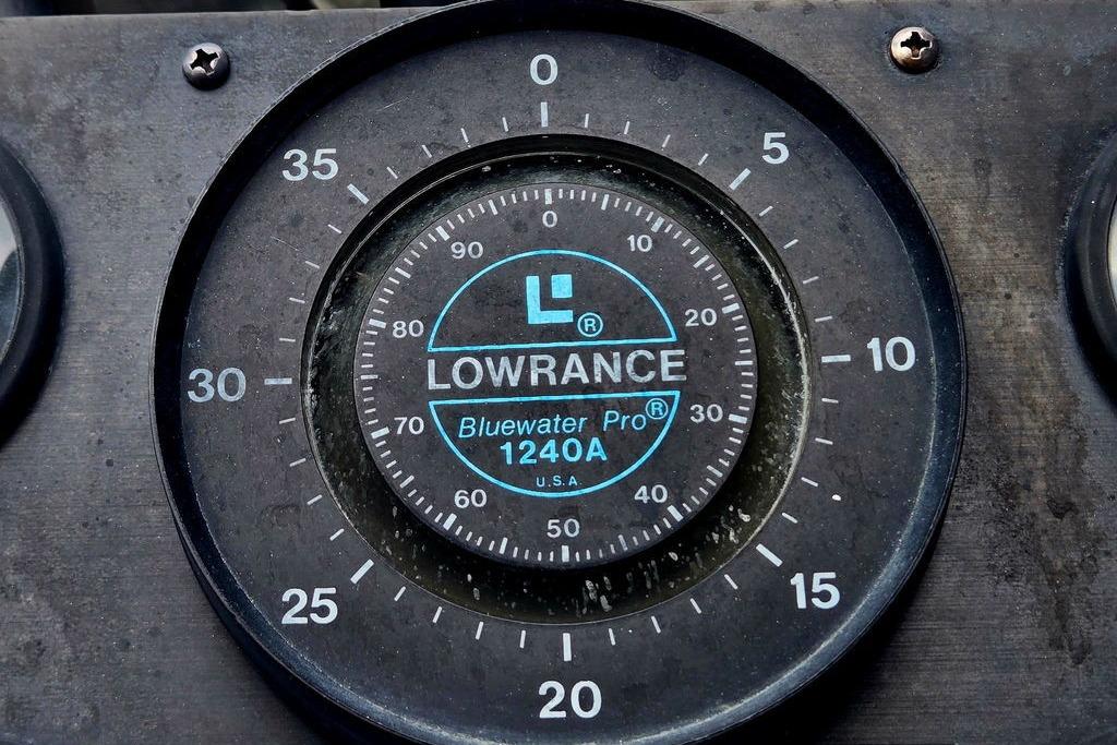 Lowrance Bluewater Pro 1240A gauge on 1996 Champion 181 SX dashboard.