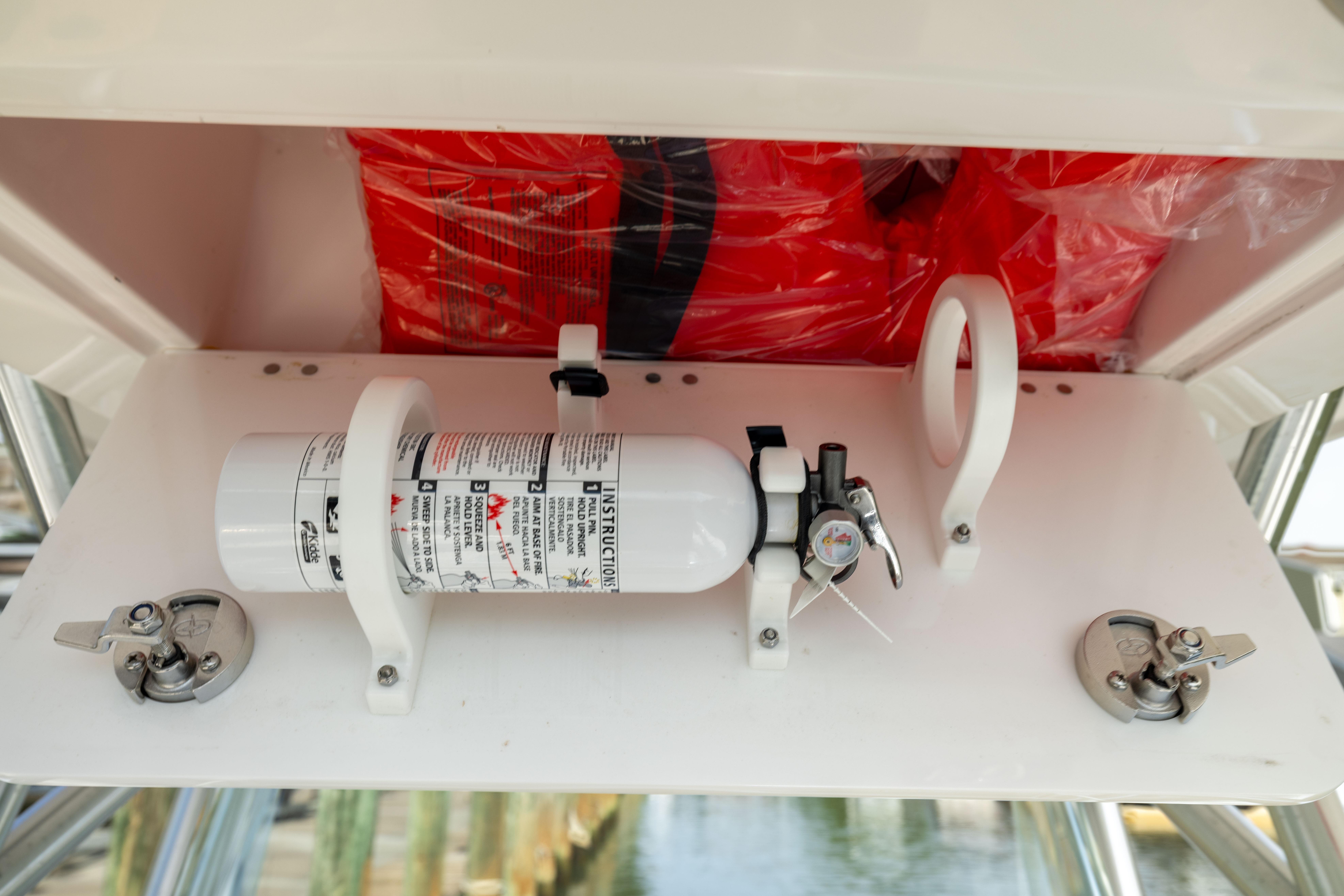 Fire extinguisher and safety equipment on 2023 Sea Fox 228 Commander boat.
