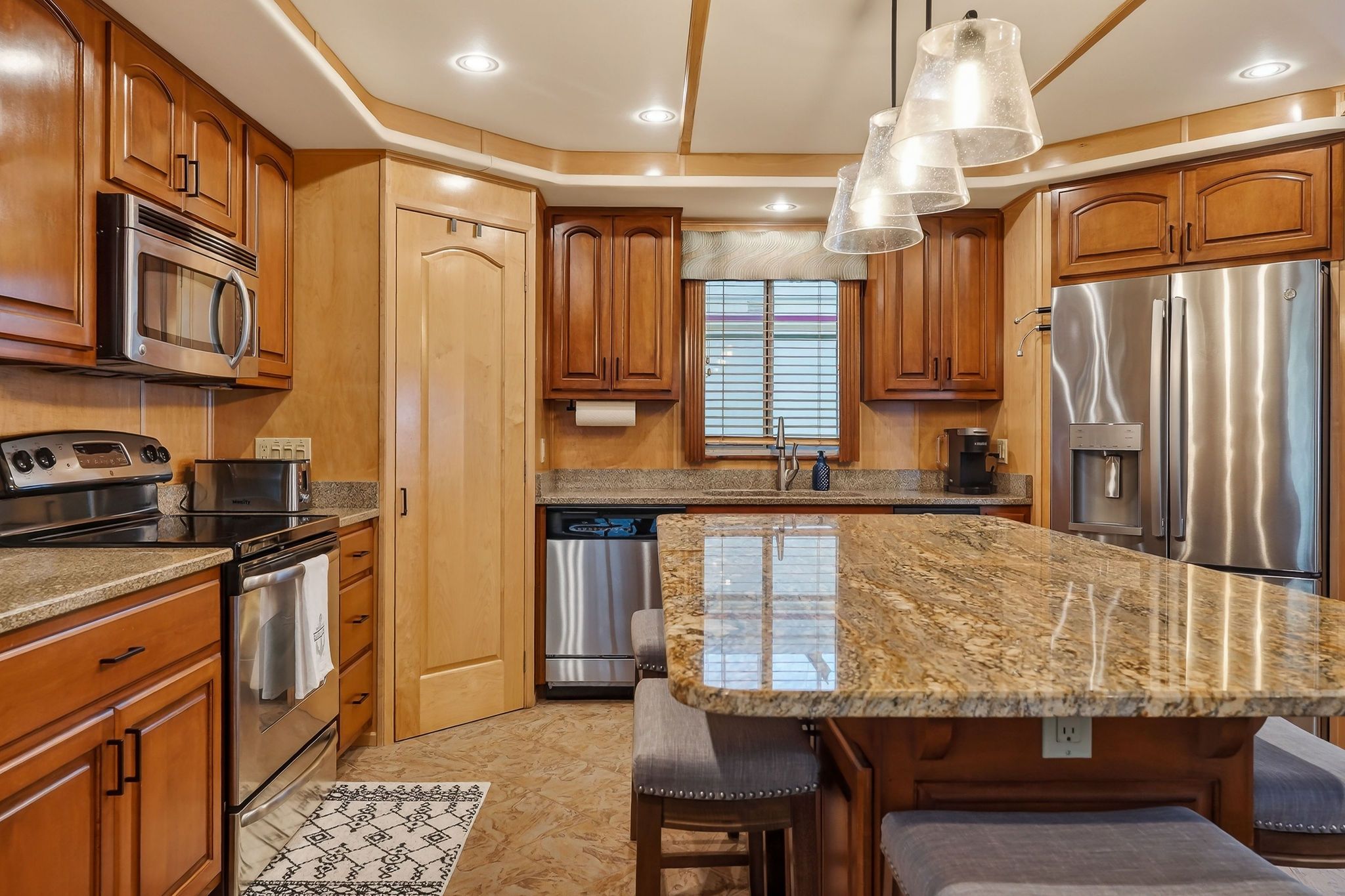 Modern kitchen on a 2010 Houseboat Throughbred.