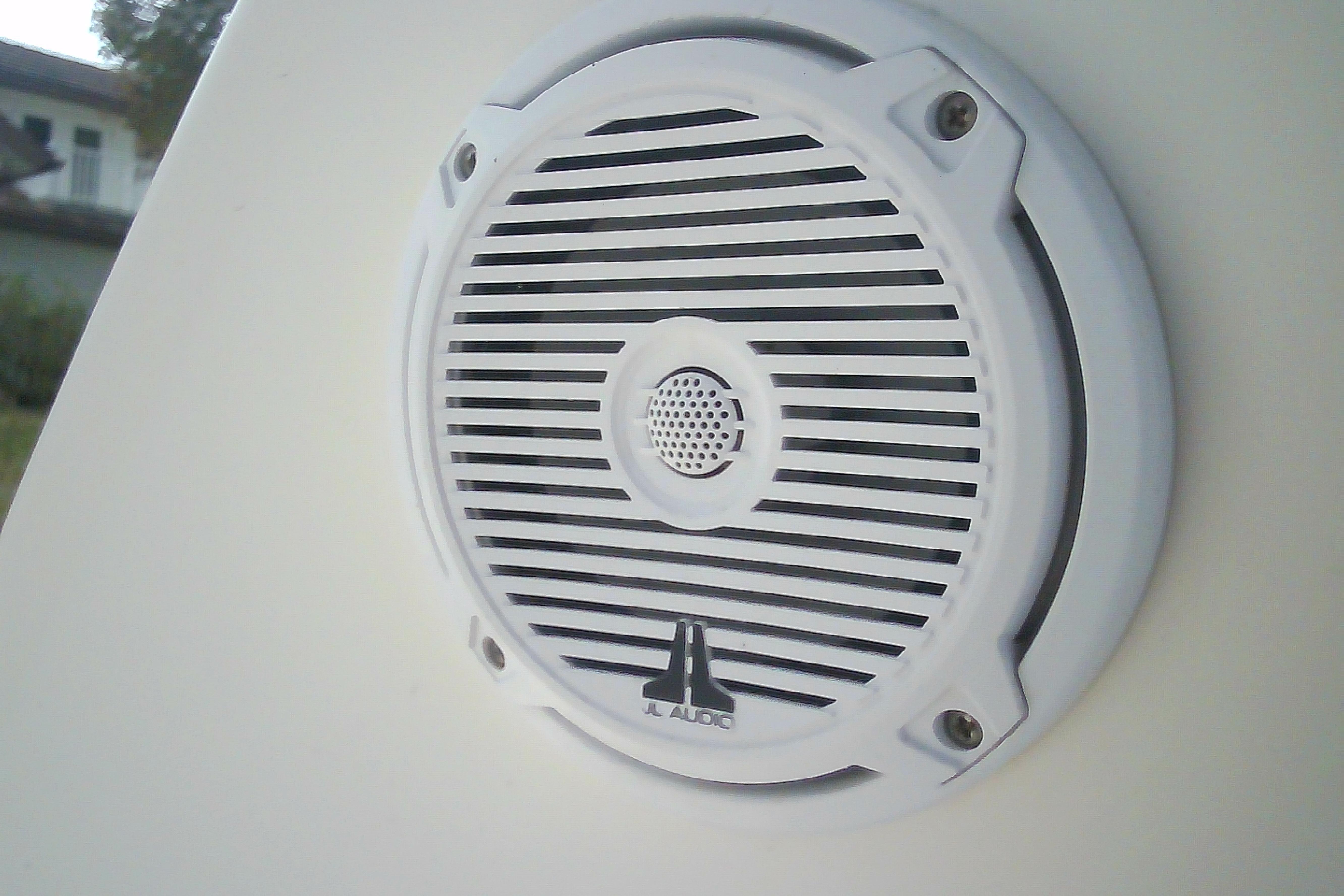 White JL Audio speaker on 2005 Sea Ray 300 Sundancer boat.