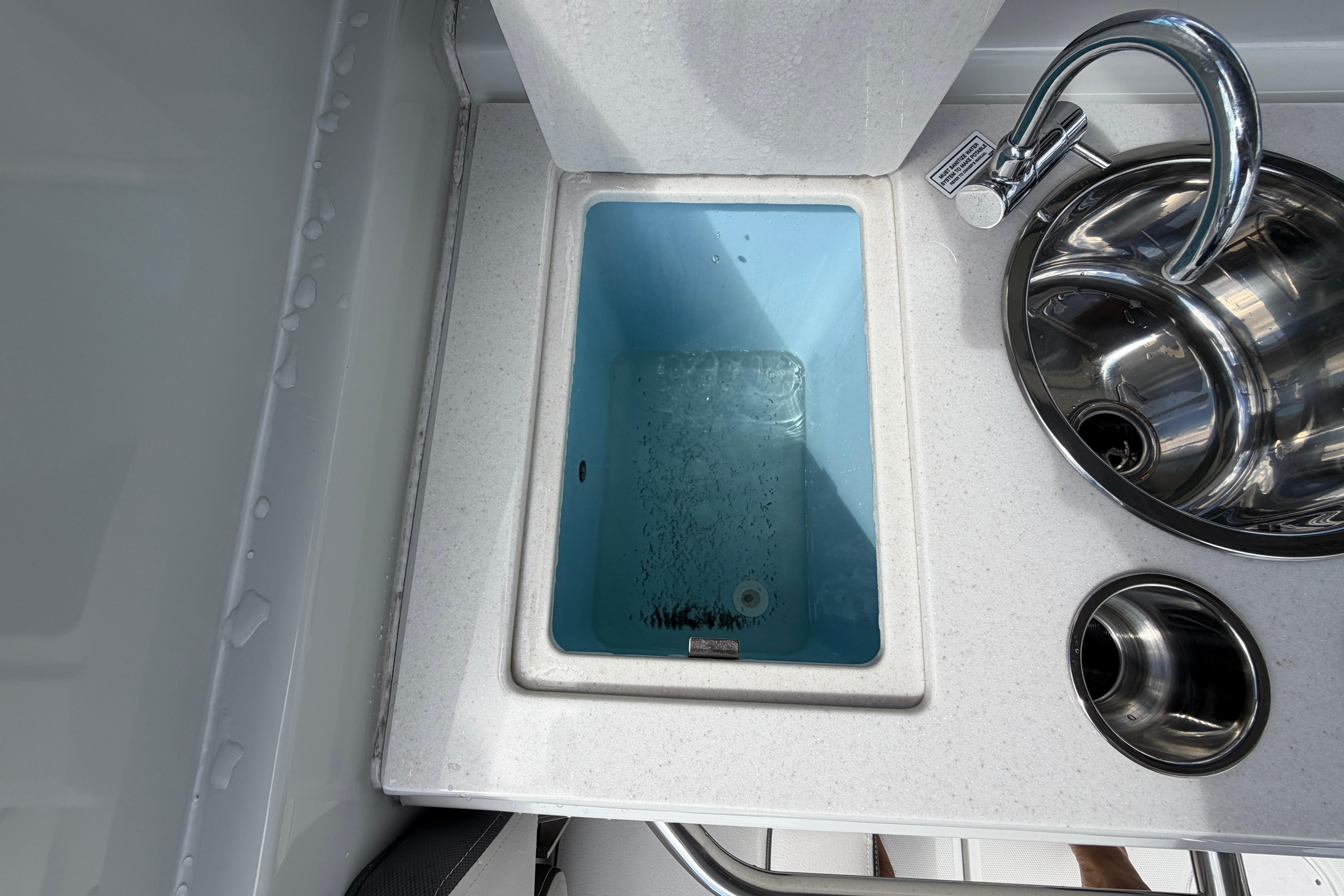 2024 Crownline 260 DC Finseeker boat sink and livewell setup.