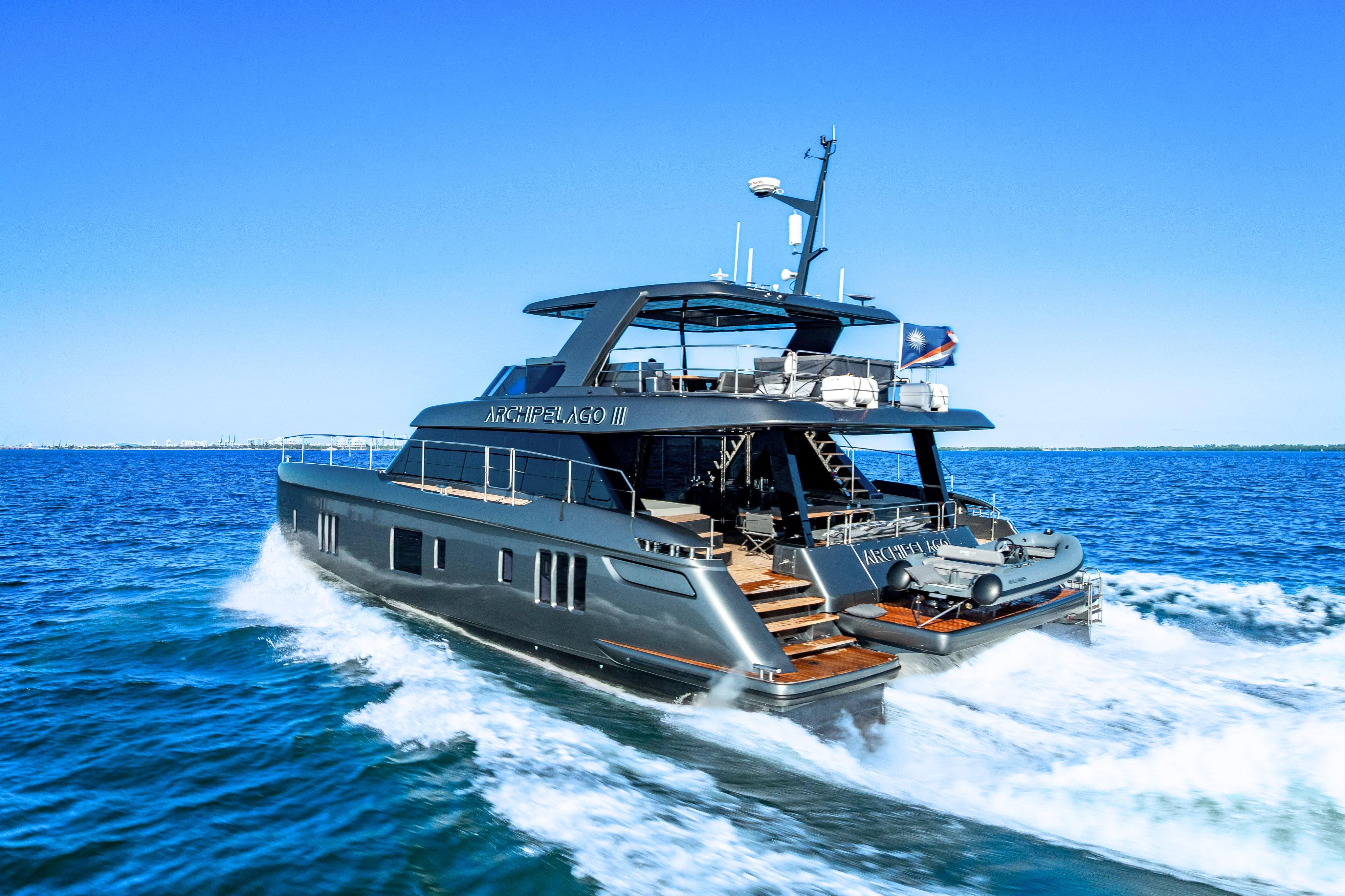 Luxurious 2026 Sunreef 60 Power yacht cruising on open blue sea.