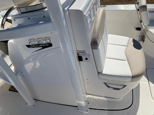 2024 Robalo 226 Cayman boat interior with white and beige seating.