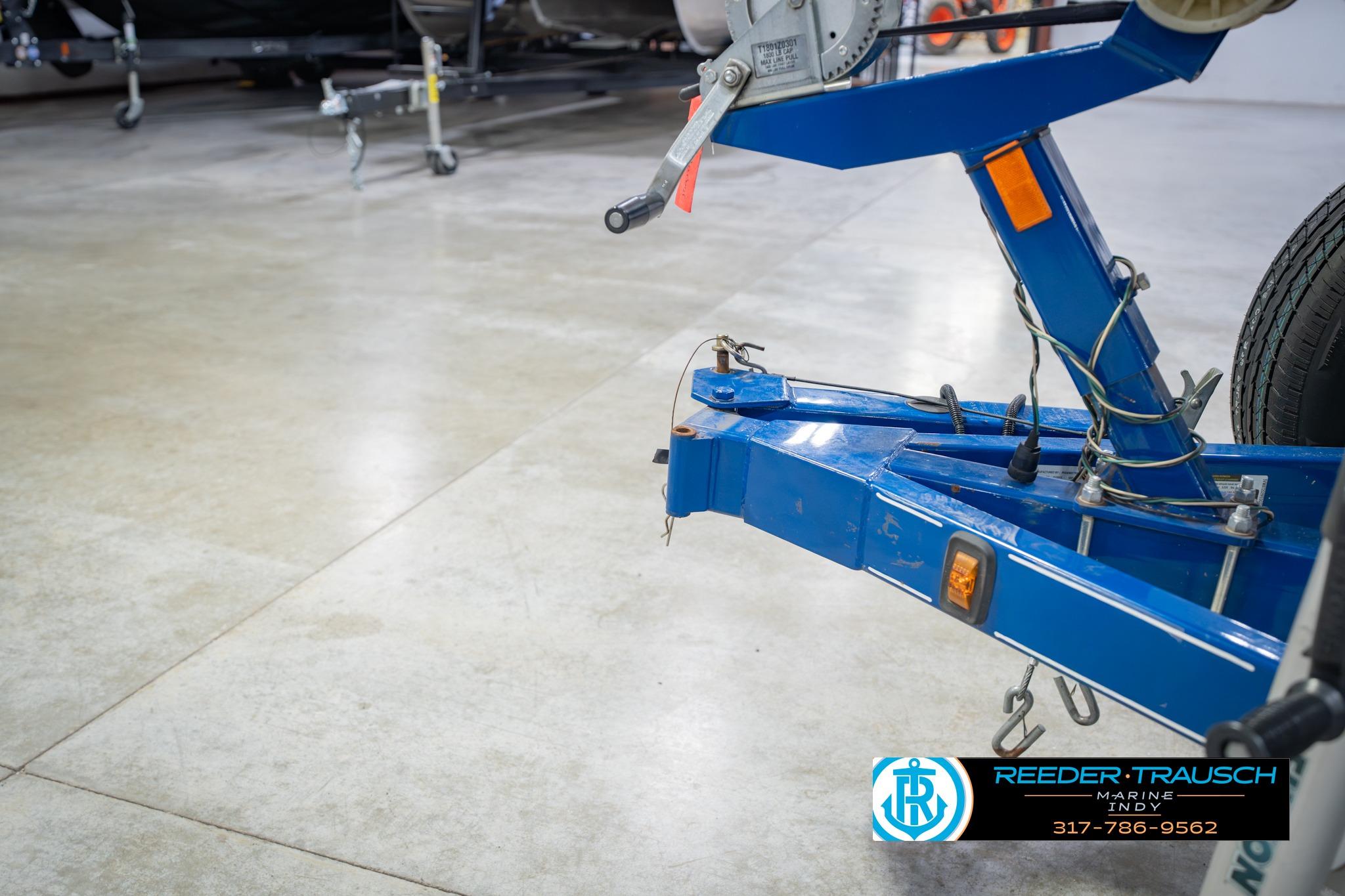 Blue trailer hitch for 2015 Regal 2000 ESX Bowrider in a showroom.