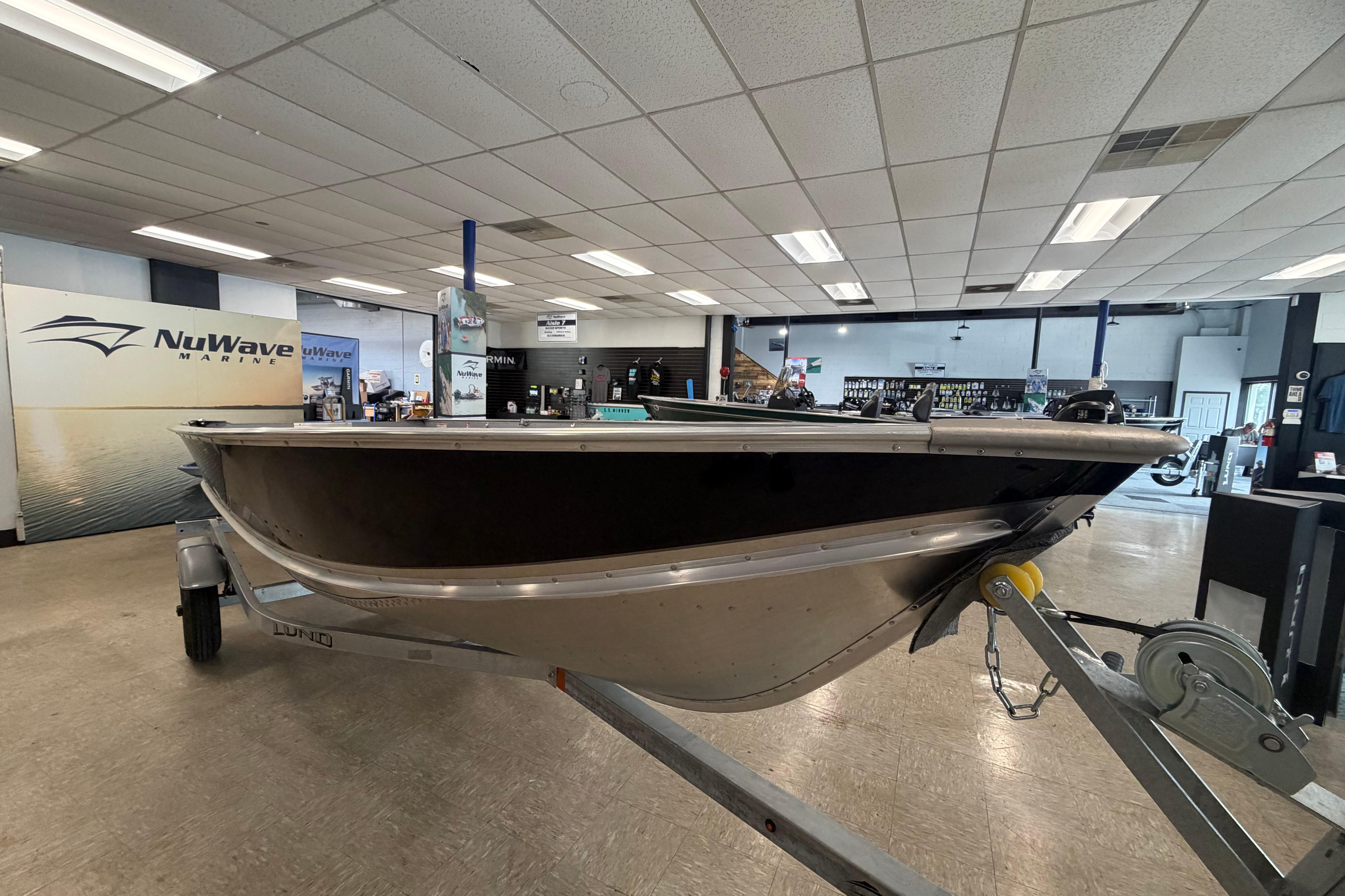 2027 Lund WC 16 boat displayed at NuWave Marine showroom.