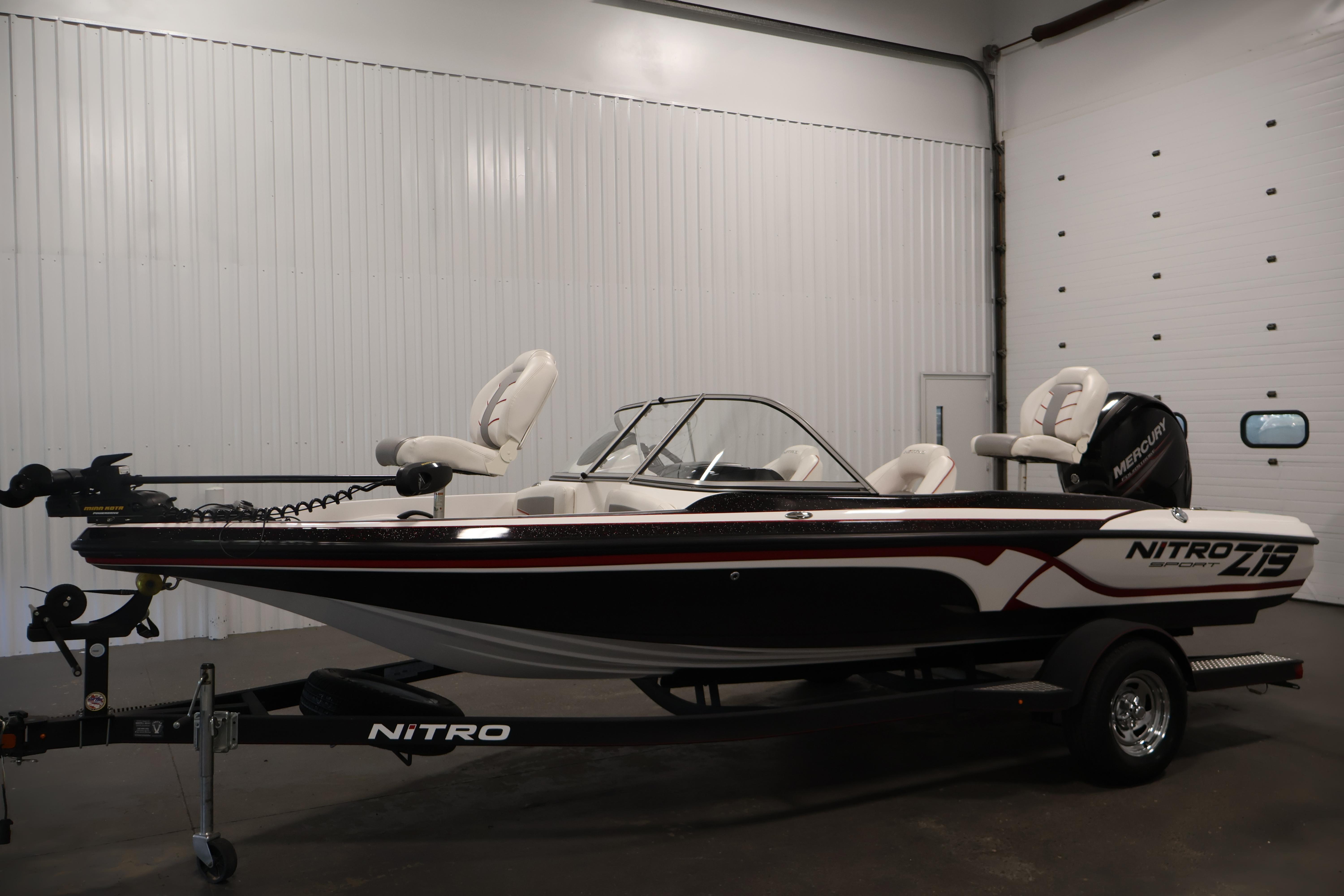 2019 Nitro Z19 Sport boat in showroom, featuring sleek design and modern seating.