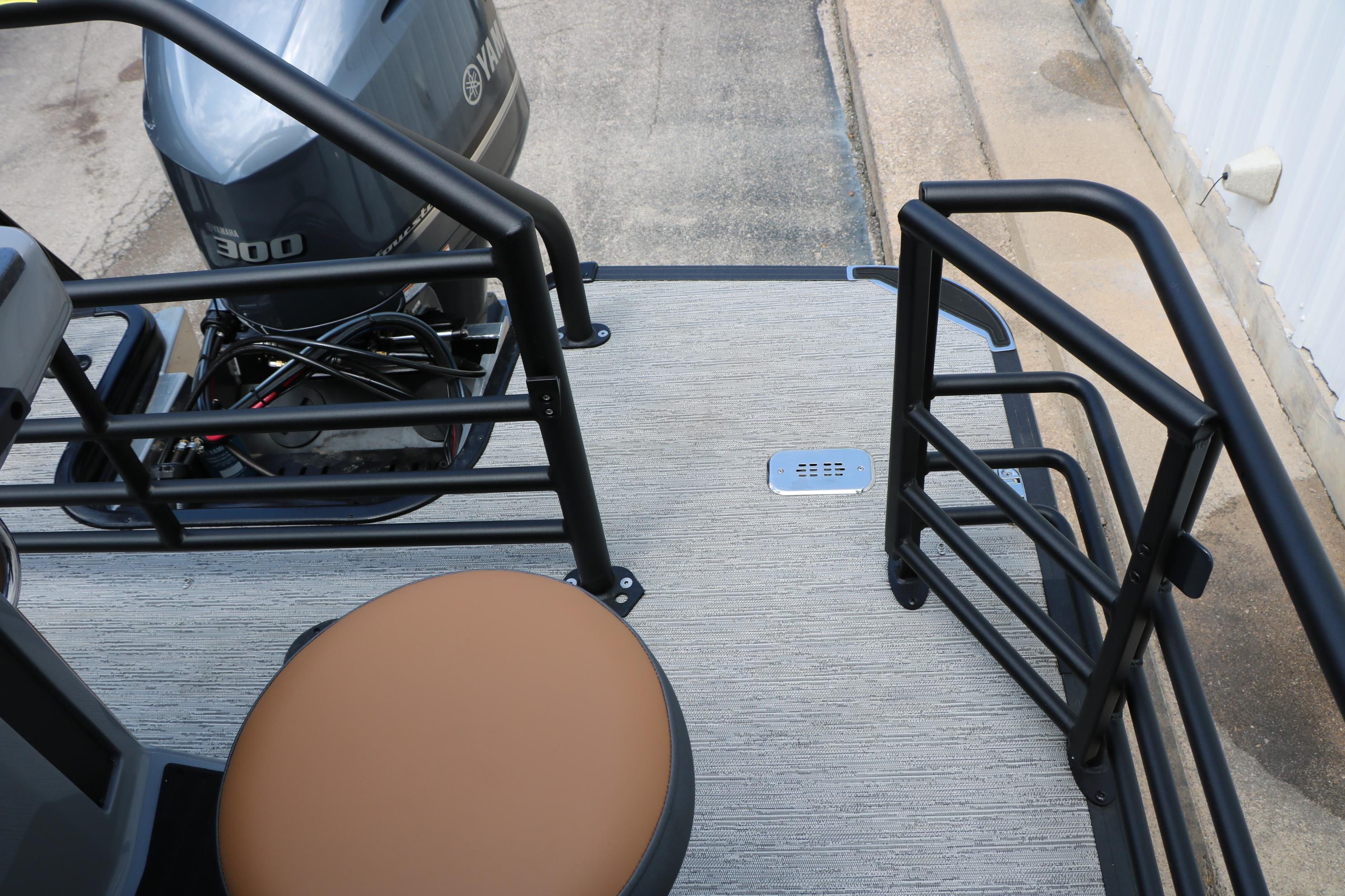Rear deck of 2026 Sylvan L3 DLZ Bar Platinum Edition Tri-Toon with Yamaha 300 engine.