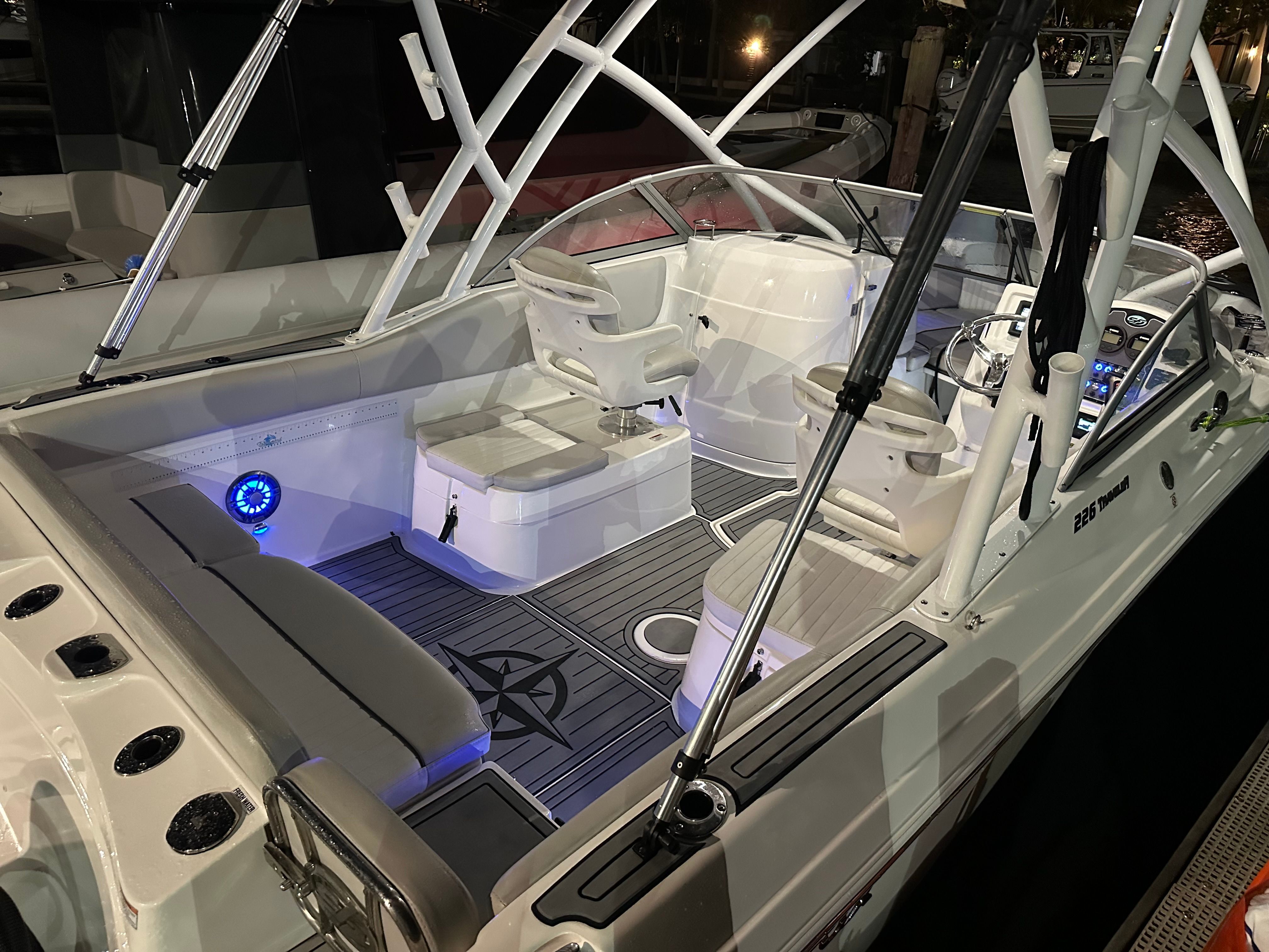 Interior view of a 2021 Sea Fox 226 Traveler boat at night.