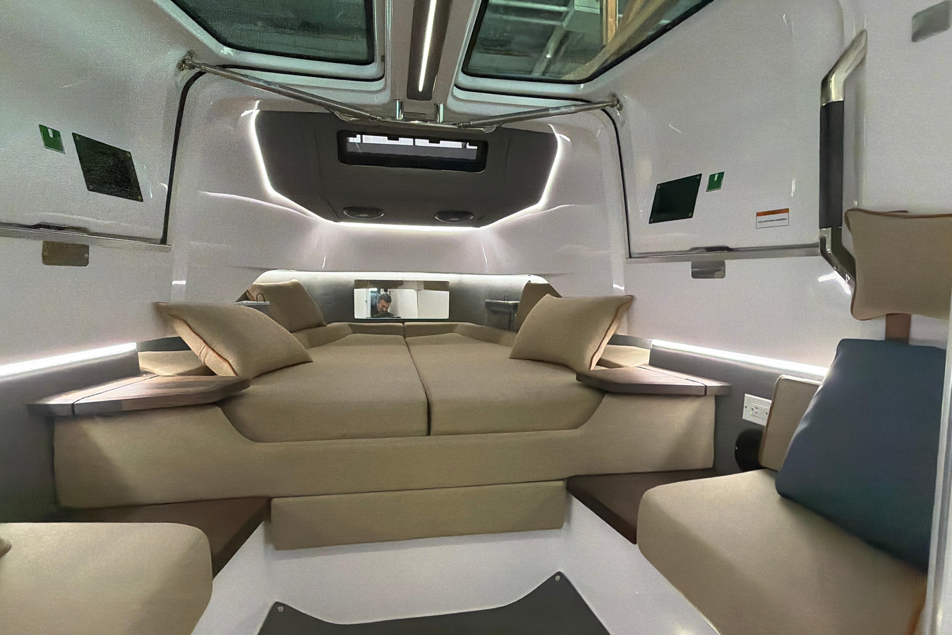 Luxurious interior of 2022 Axopar Brabus 37 XC Cross Cabin with modern design and comfortable seating.
