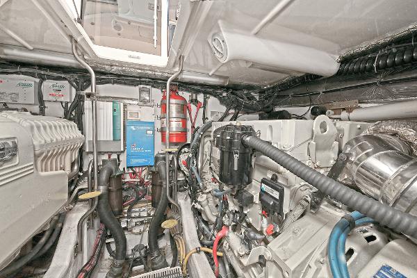 Engine room of 2008 Tiara Yachts 4200 Open, showcasing mechanical components and equipment.