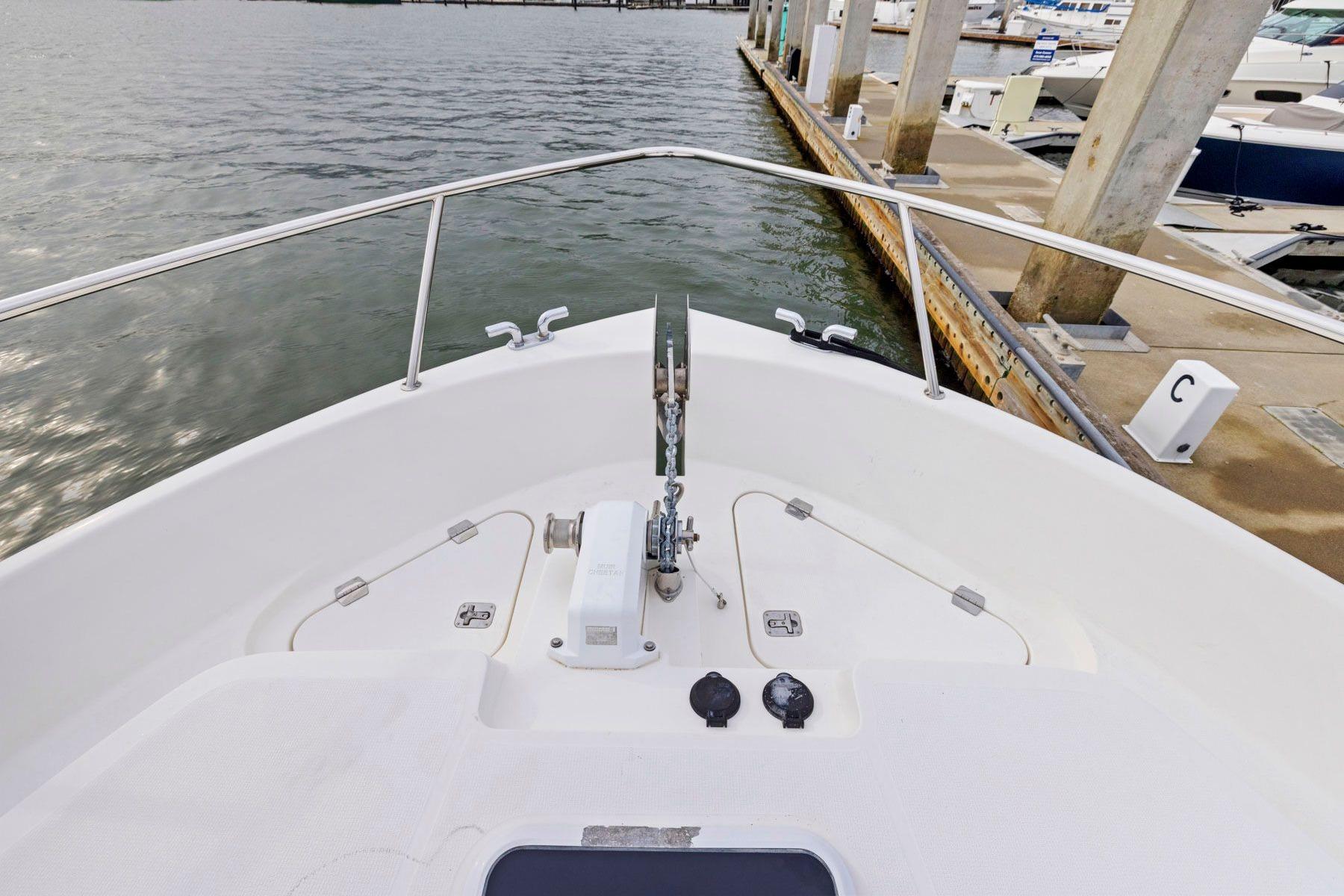Bow view of 2014 Maritimo M50 yacht docked at marina.