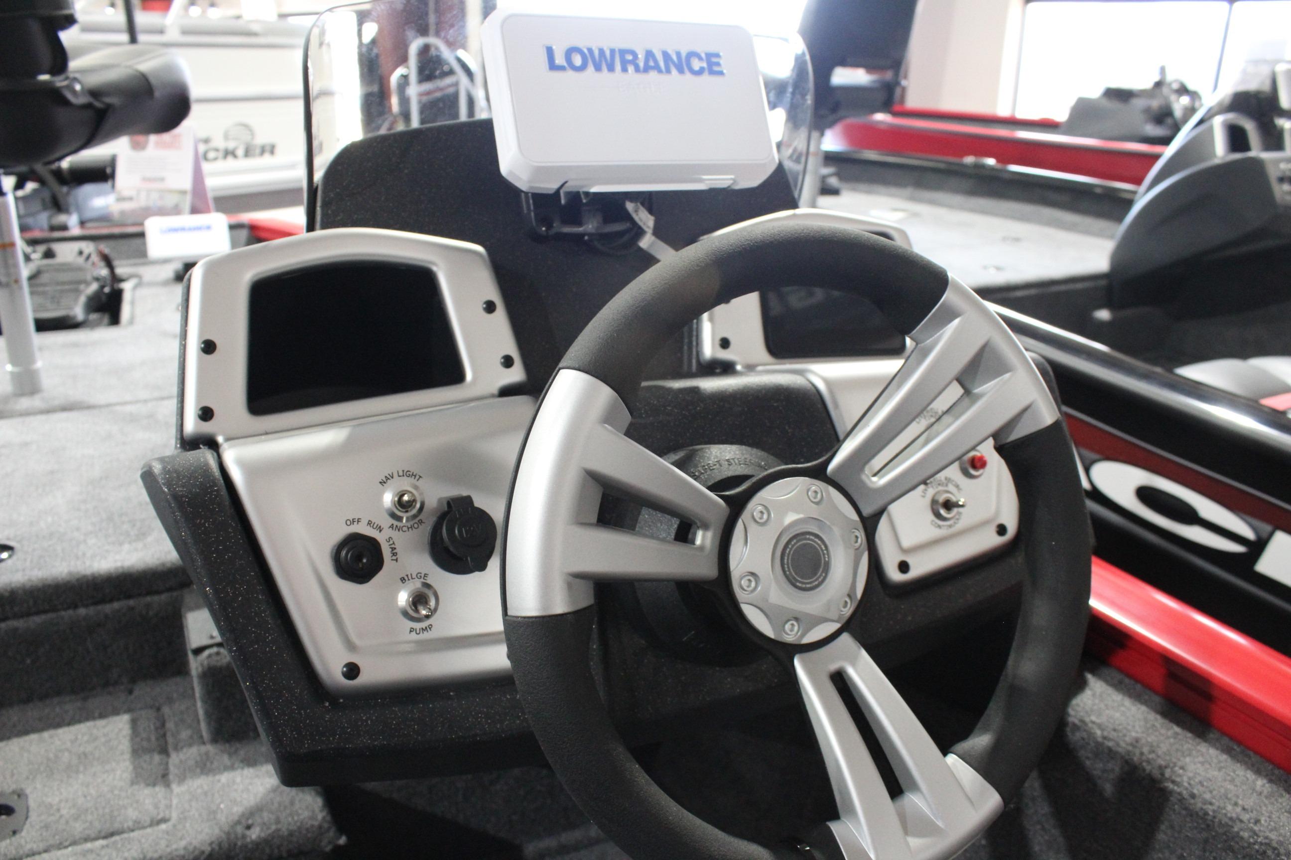 2026 Tracker Pro Team 175 boat dashboard with steering wheel and Lowrance display.