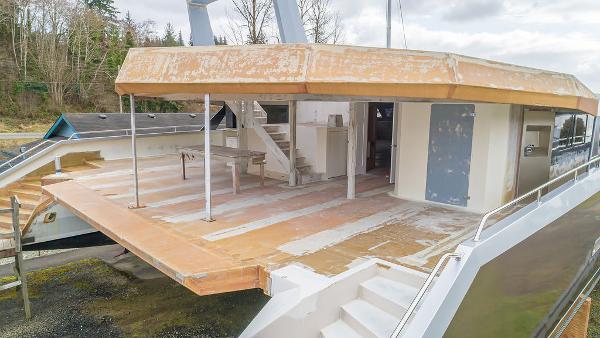 2025 Catamaran Bloomfield 86 Motorsailor under construction, showcasing spacious deck and modern design.