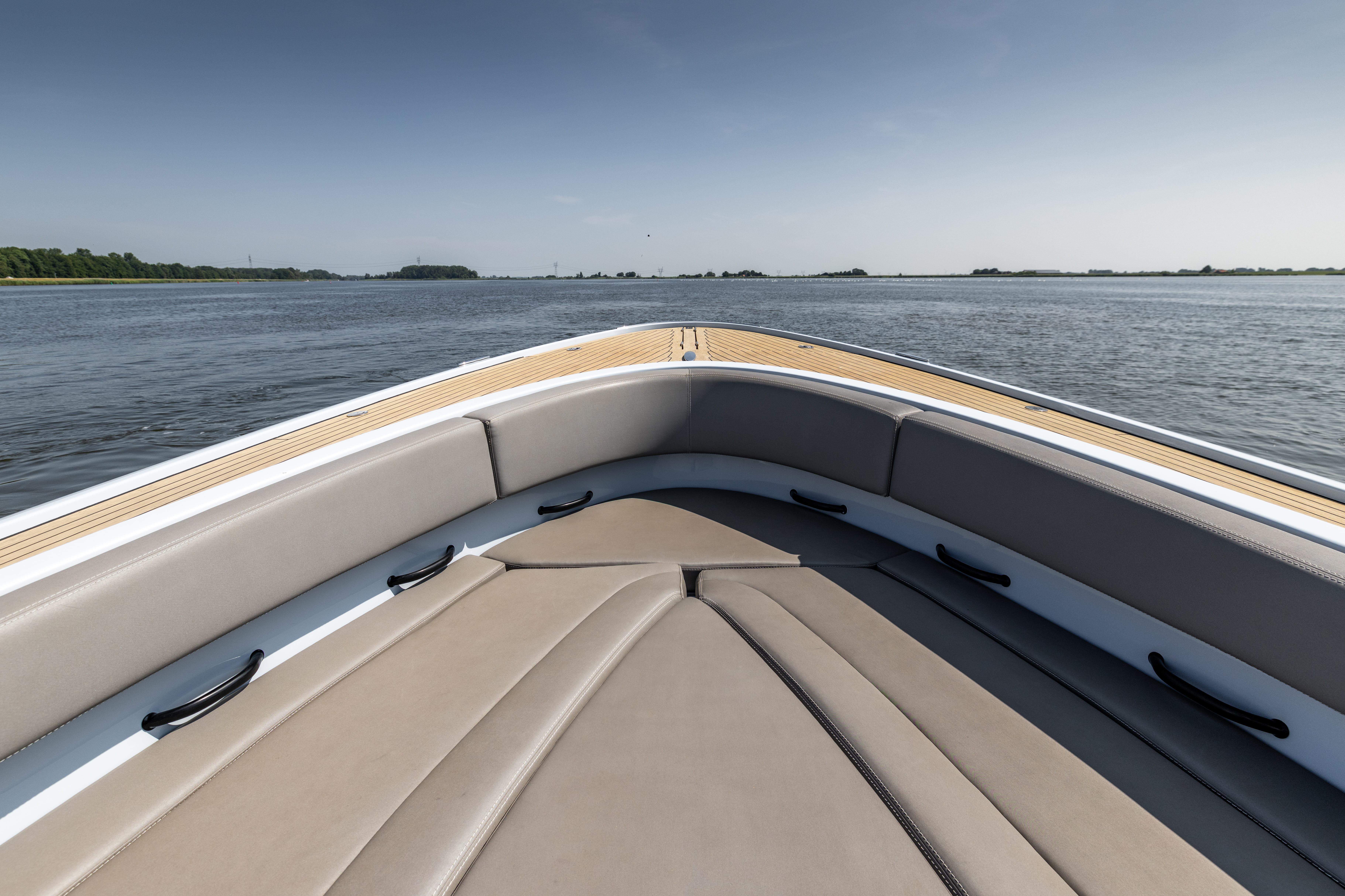 Bow view of 2017 Wajer 38 yacht on calm waters under clear sky.