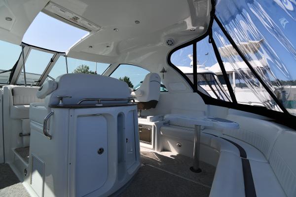 Interior of 2010 Cruisers Yachts 390 Sports Coupe, featuring sleek seating and modern design.