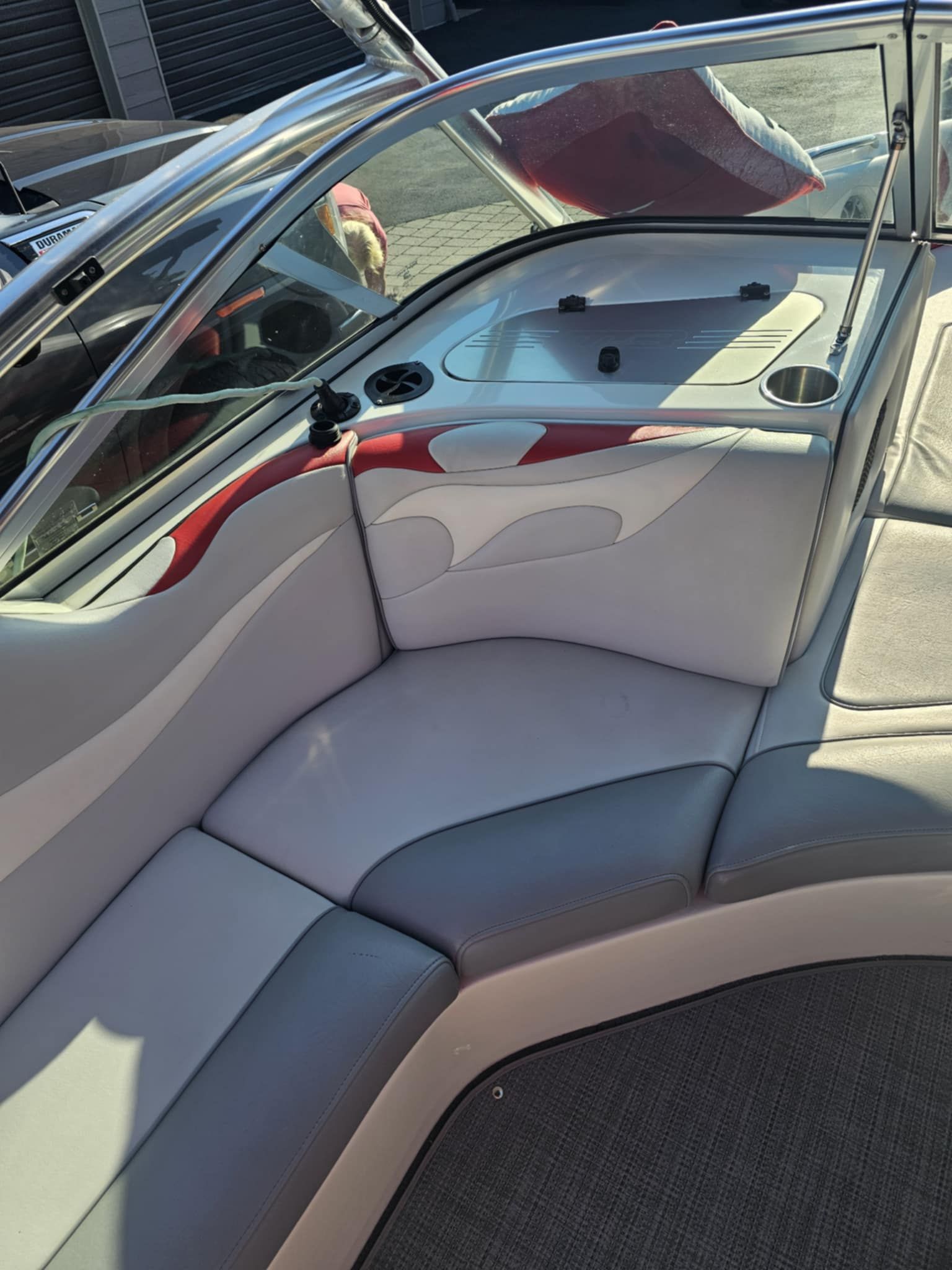 Interior of a 2006 MB PIGPR boat with cushioned seating.