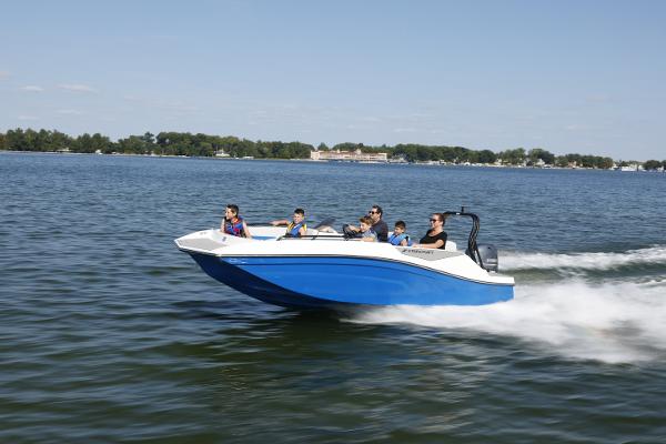 2025 Starcraft SV 16 OB boat cruising on a lake with passengers enjoying the ride.