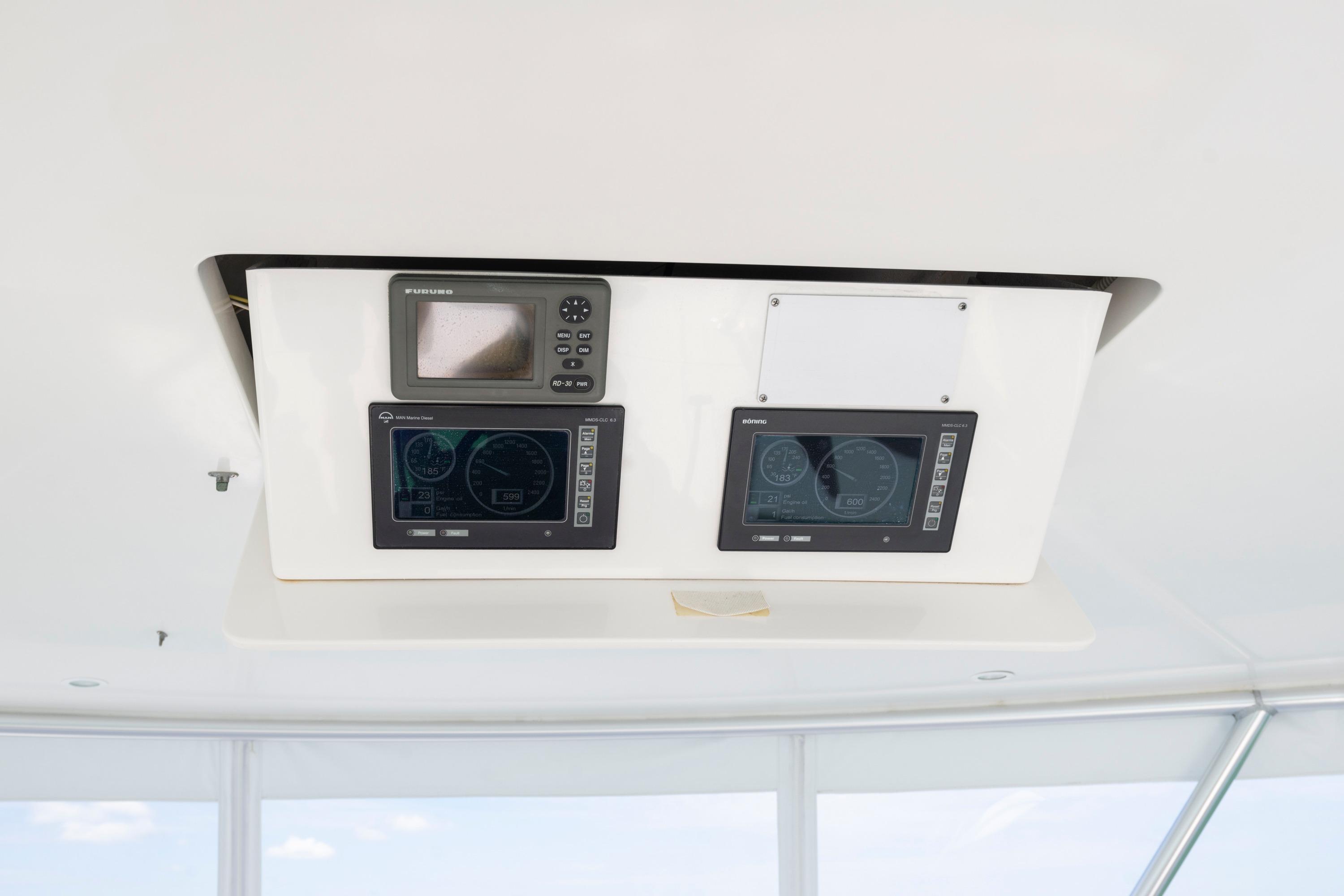 2009 Viking 50 Convertible yacht dashboard with navigation and control displays.