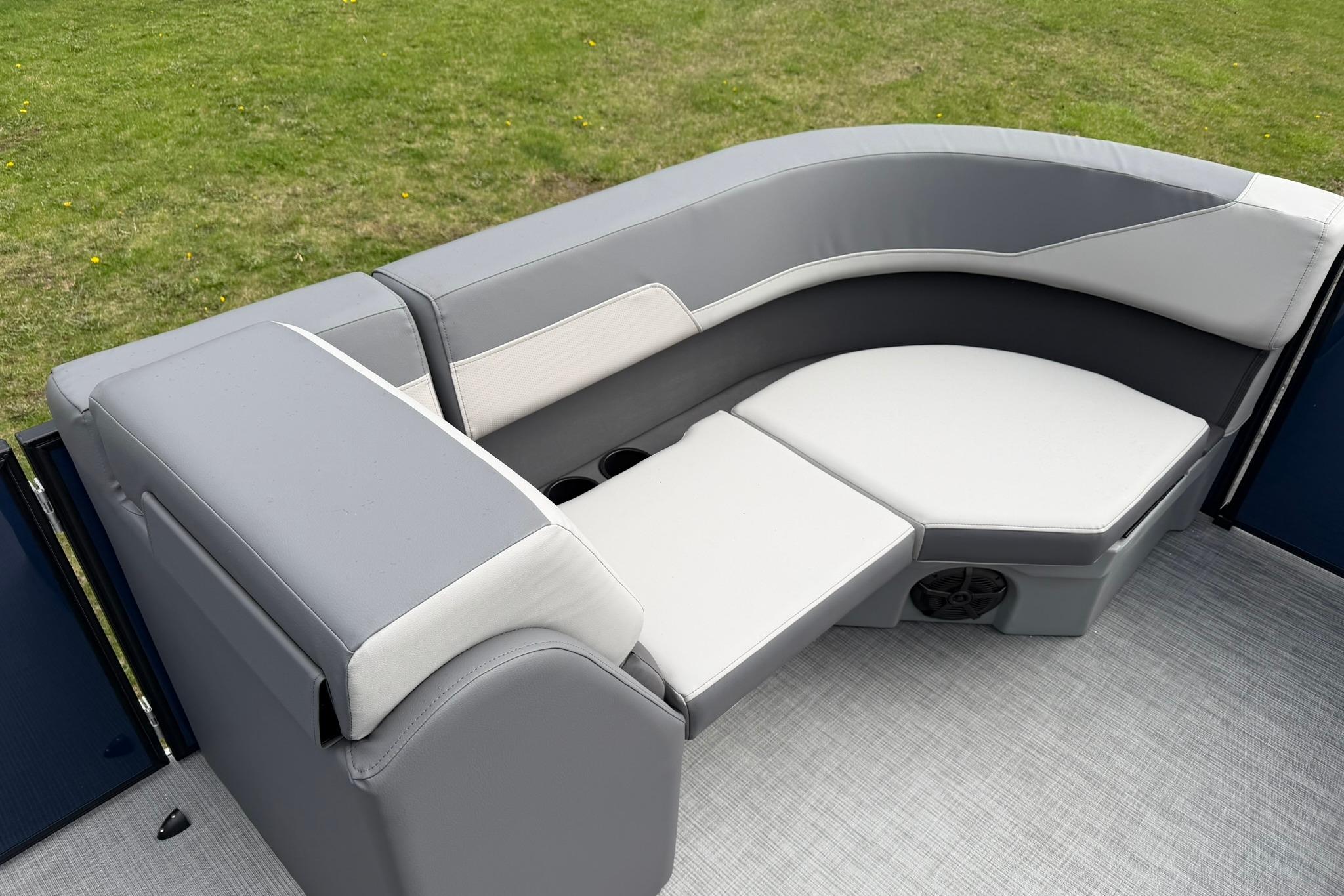 Luxurious seating on 2026 Lowe LS 190 boat, featuring sleek gray upholstery and modern design.