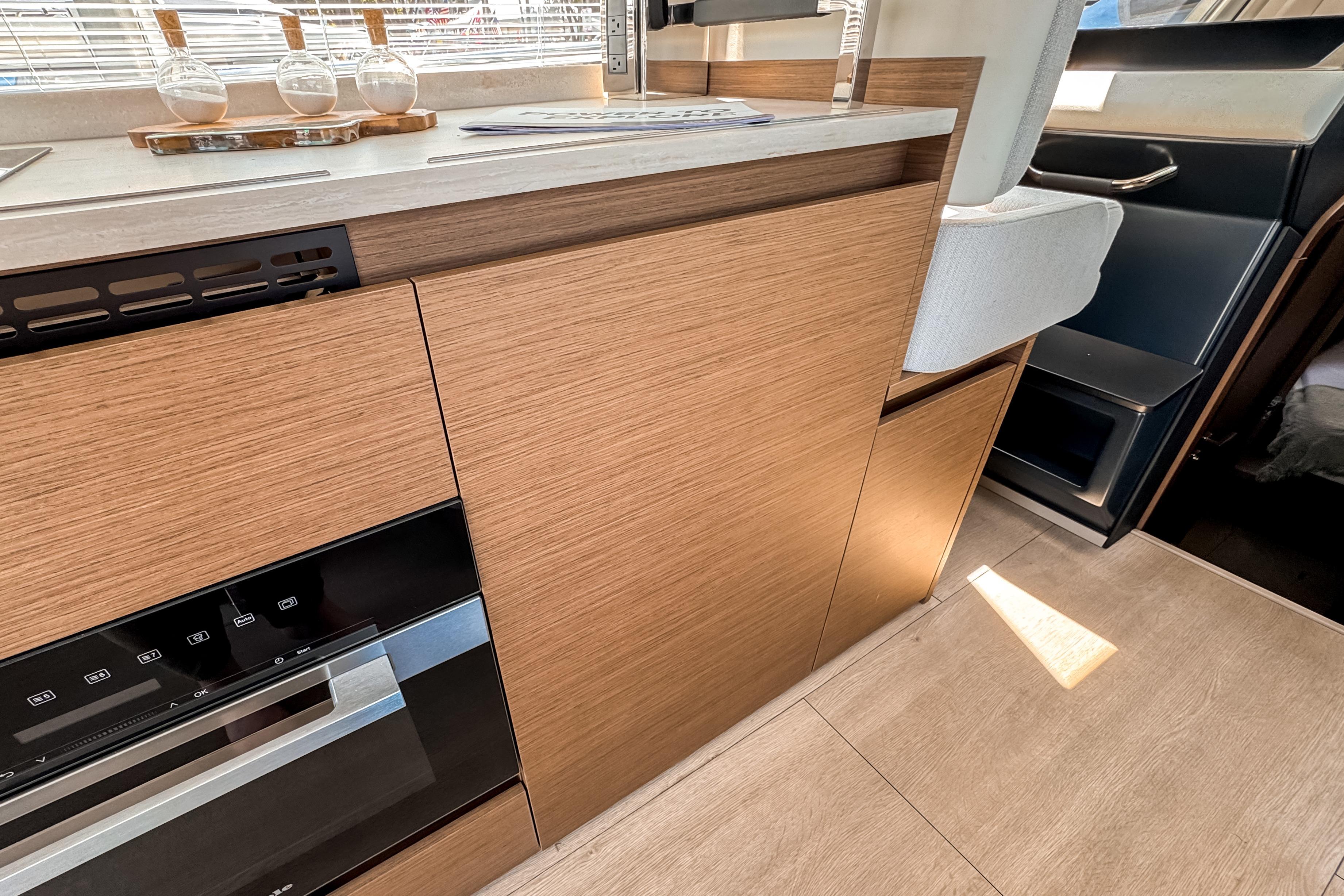 Interior of Wellcraft 44 Explorer 2026 featuring modern kitchen.