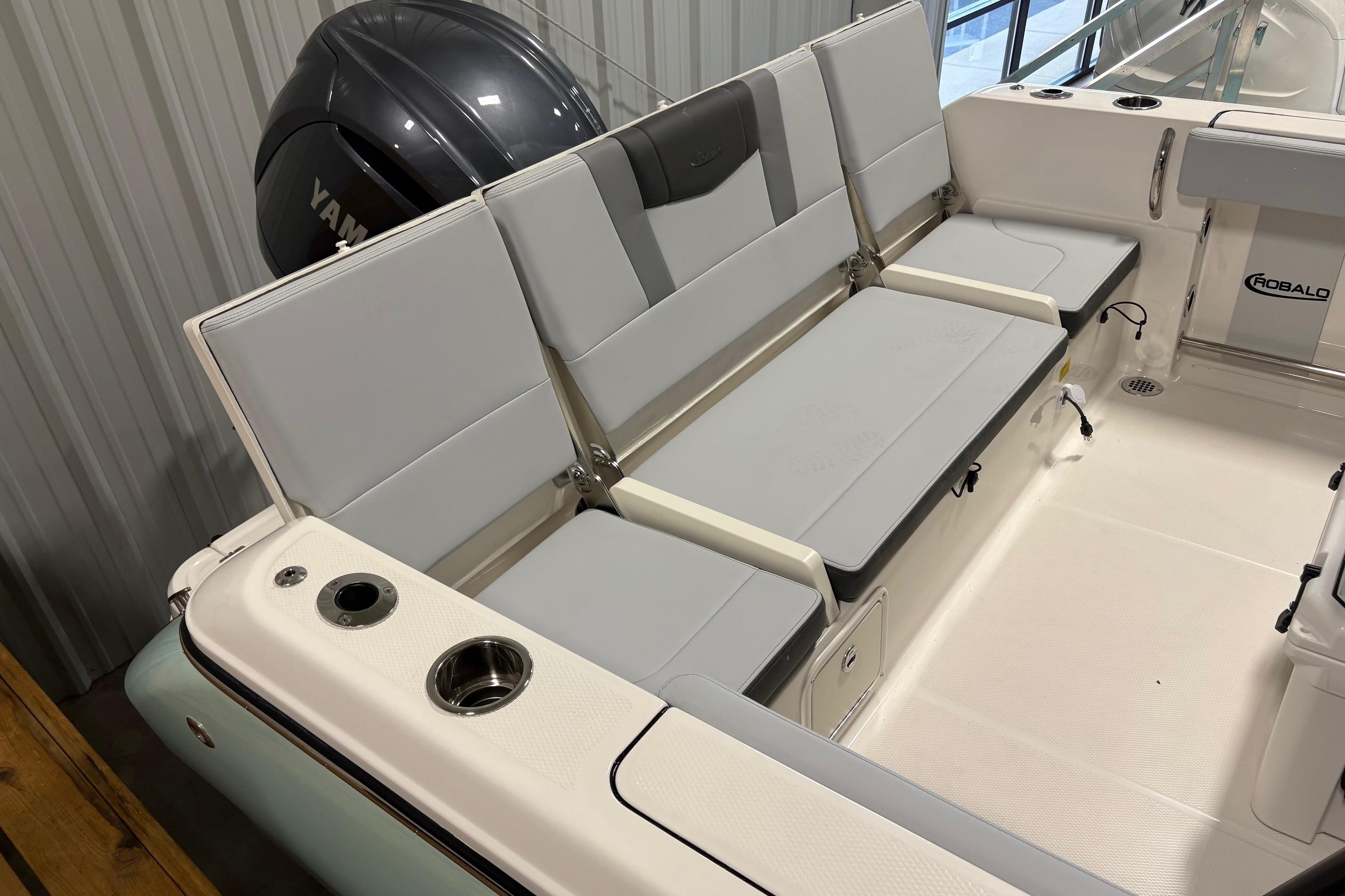 2025 Robalo R232 Explorer boat interior with seating and Yamaha engine.